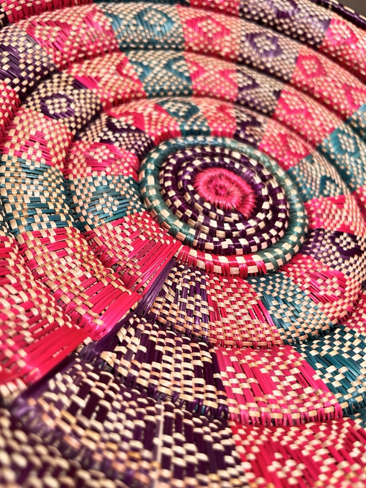 Woven raffia basket geometric pattern pink teal purple Ethiopian style 12”