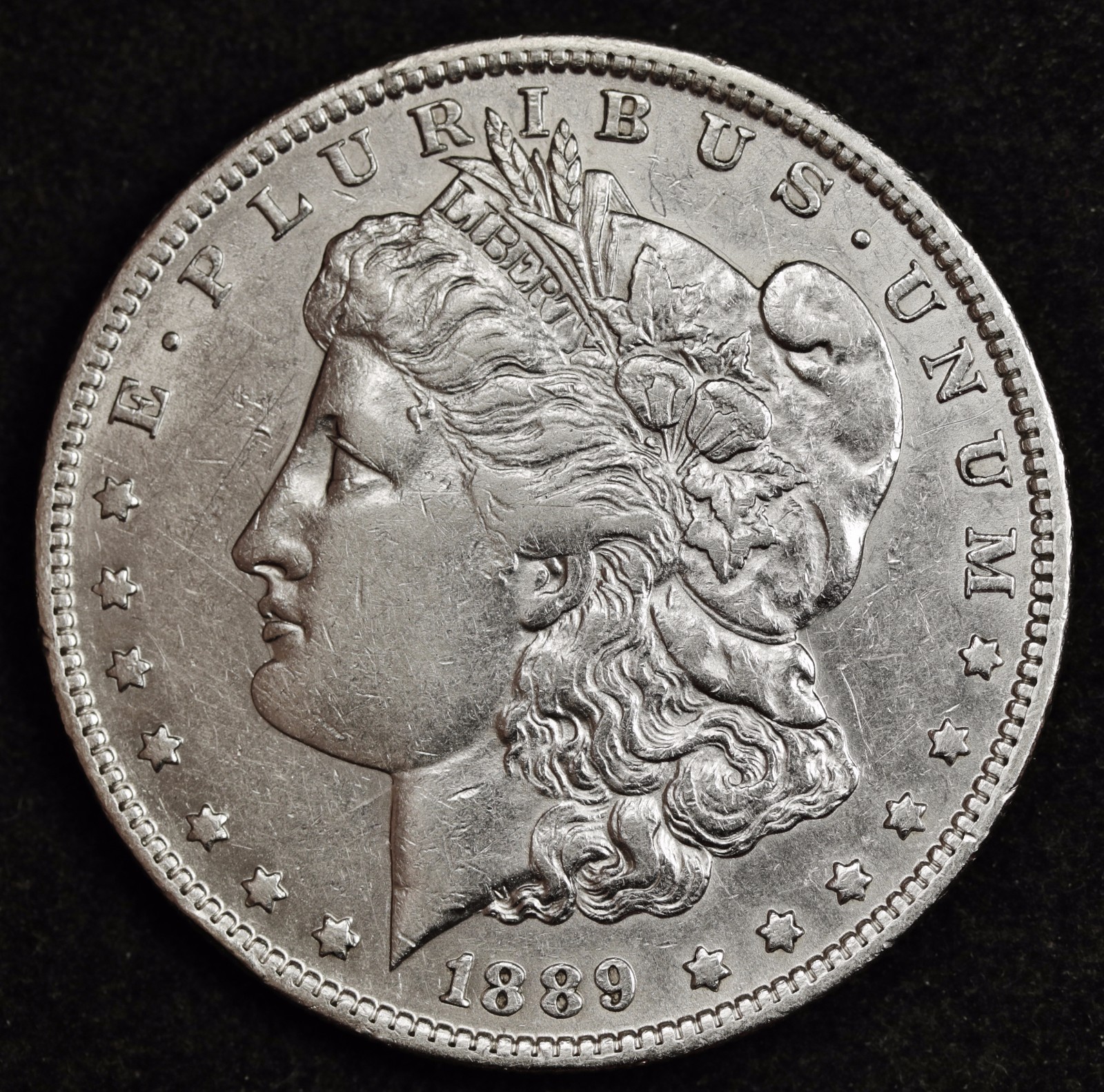 1889-o Morgan Silver Dollar.  A.U.  104494  Inventory H