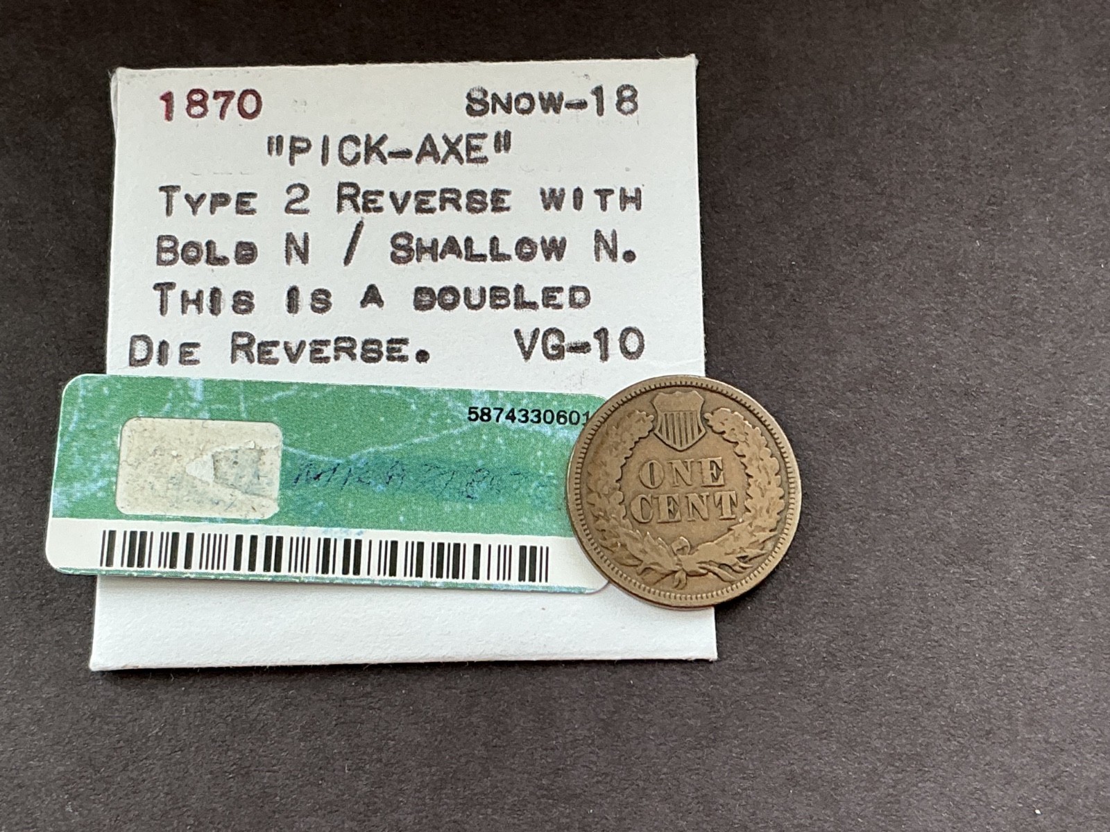 1870 indian head cent “ PICK AXE “. VG-10 choice