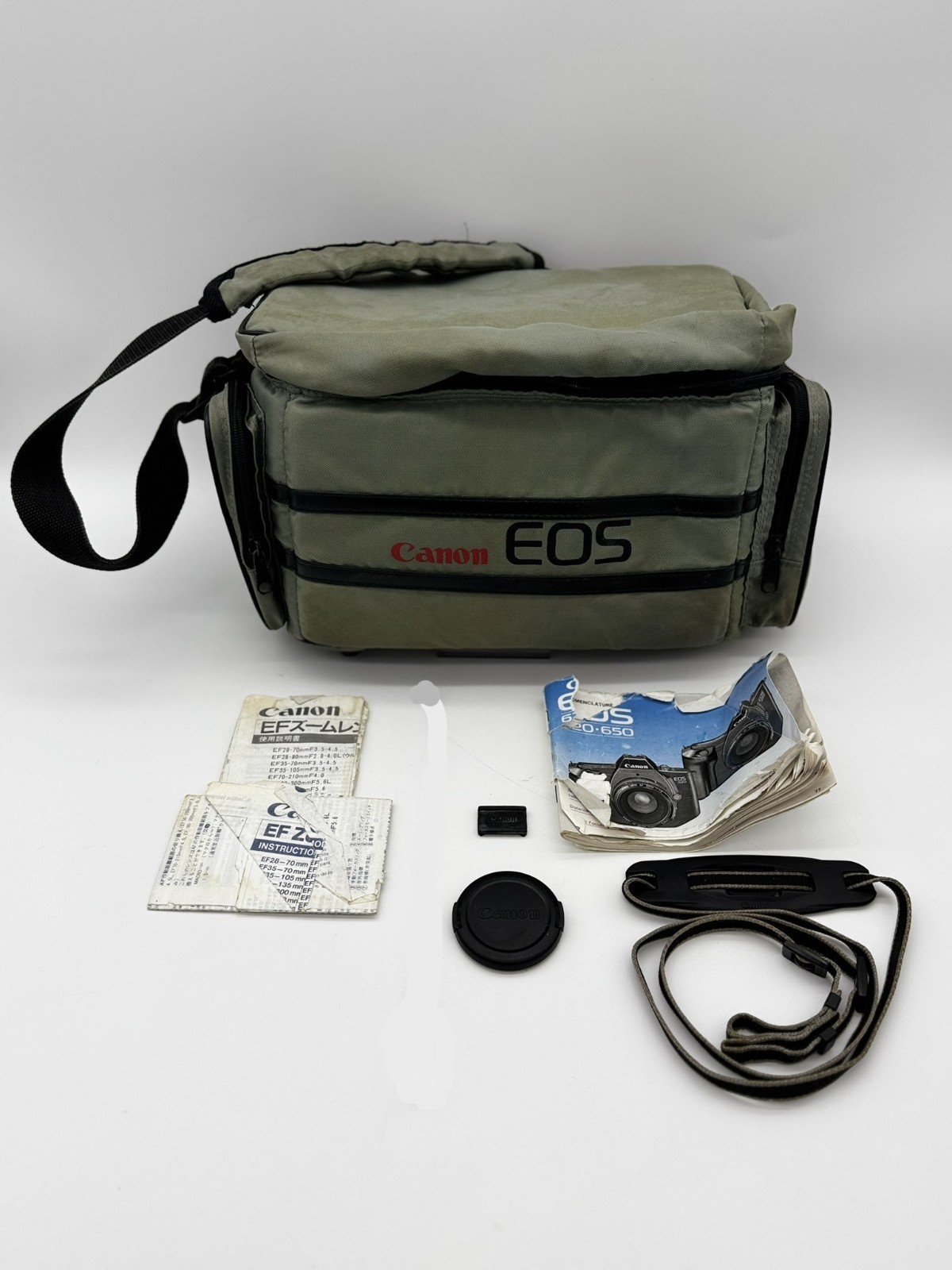 LOT OF CANON EOS bag, cap, manuel 620 650, strap.  Vintage.  As is.