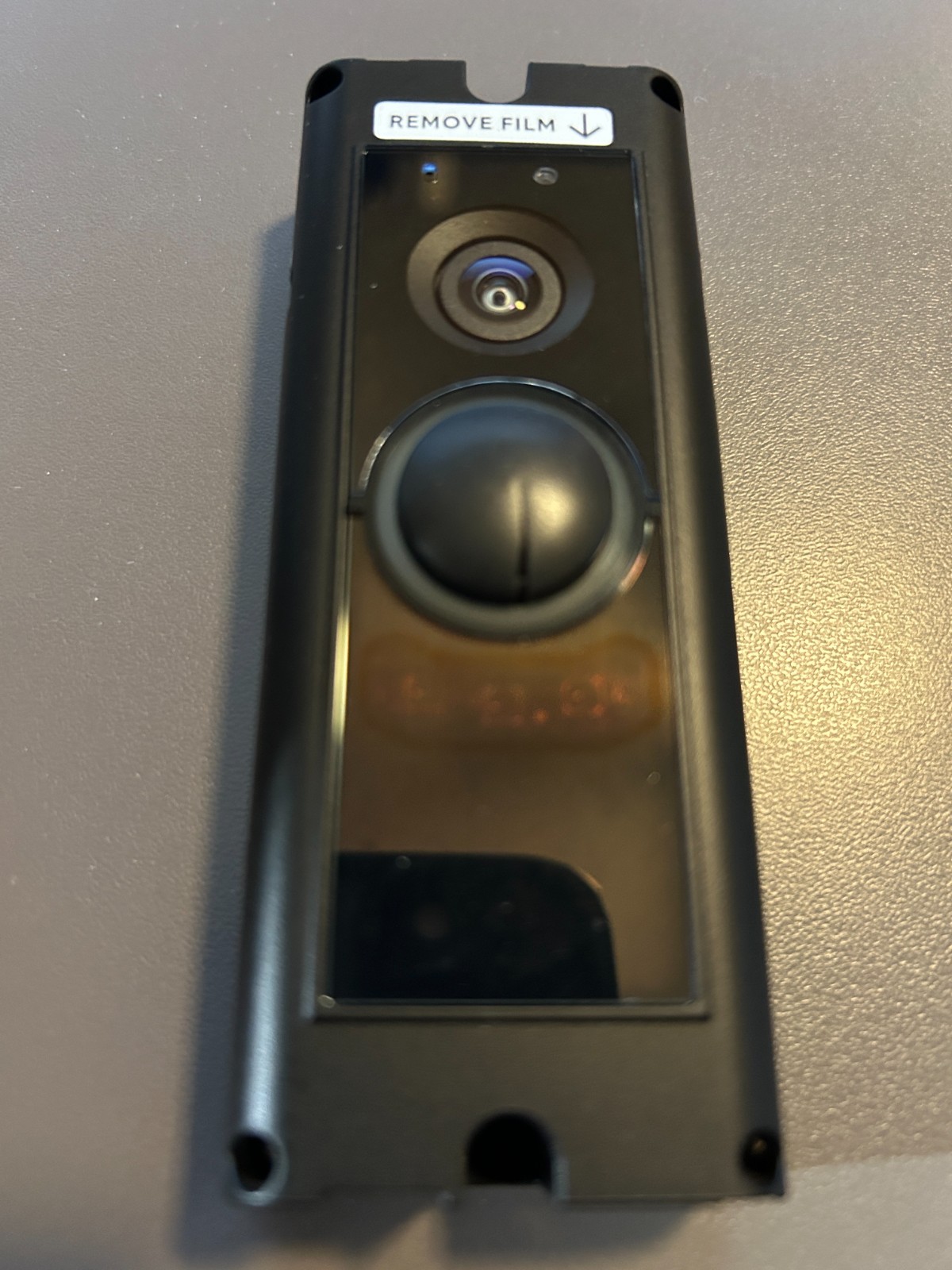 Ring video doorbell pro hardwired with a crack in button and functions as normal