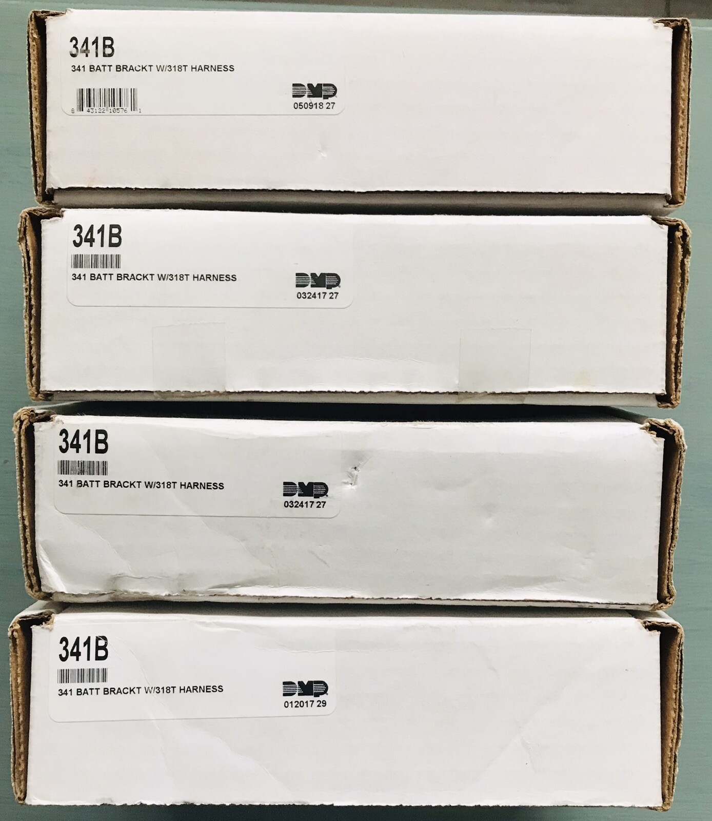 DMP 341B BATTERY BRACKET W 318T HARNESS (LOT OF 4) - NEW