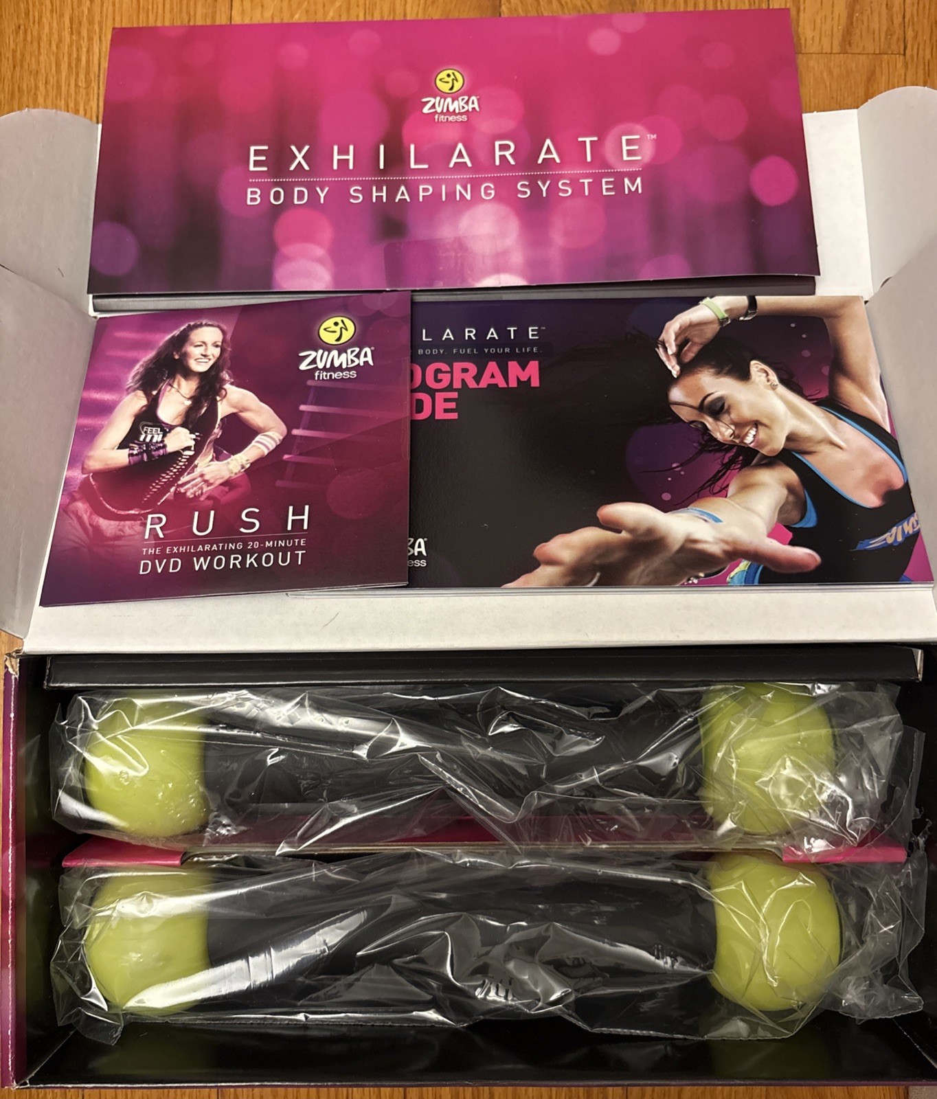 Zumba Fitness Exhilarate! 5 DVD Set & Two Toning Sticks & Program Guide OPEN BOX