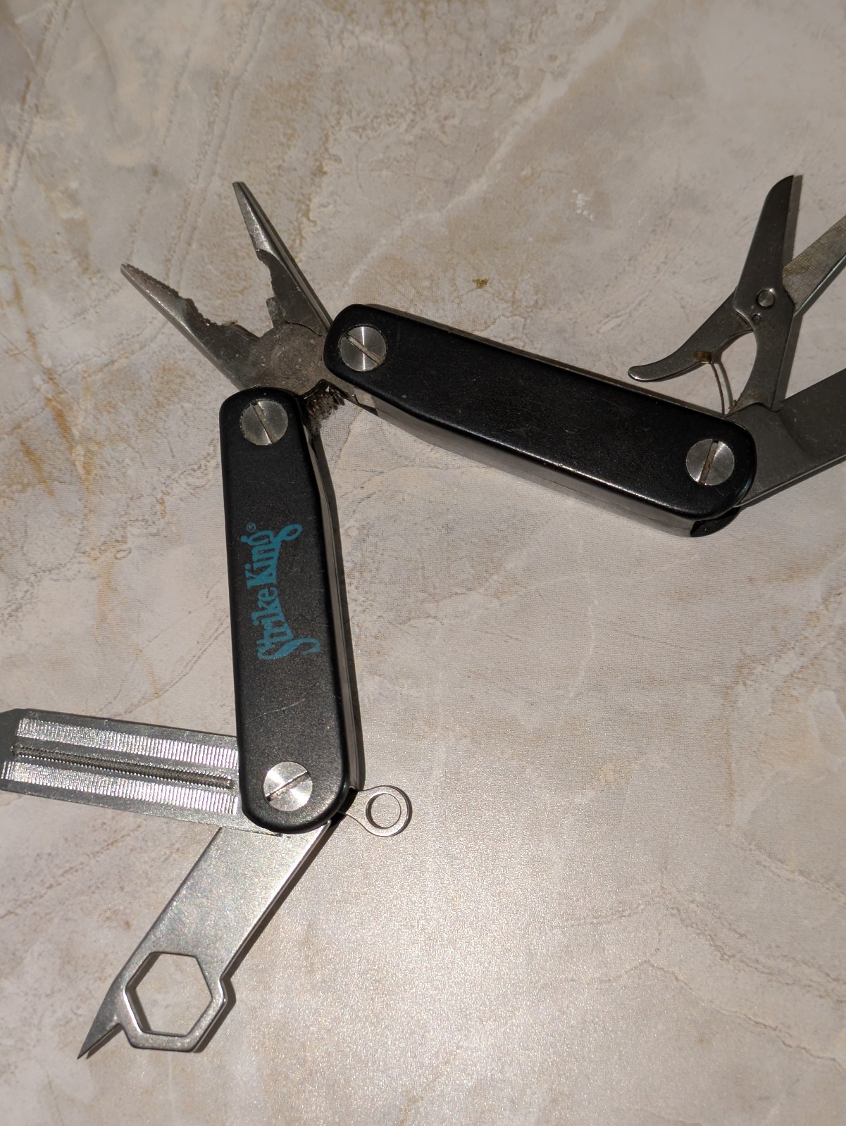 Black STRIKE KING Multi-Tool with Pliers File Scissors & More