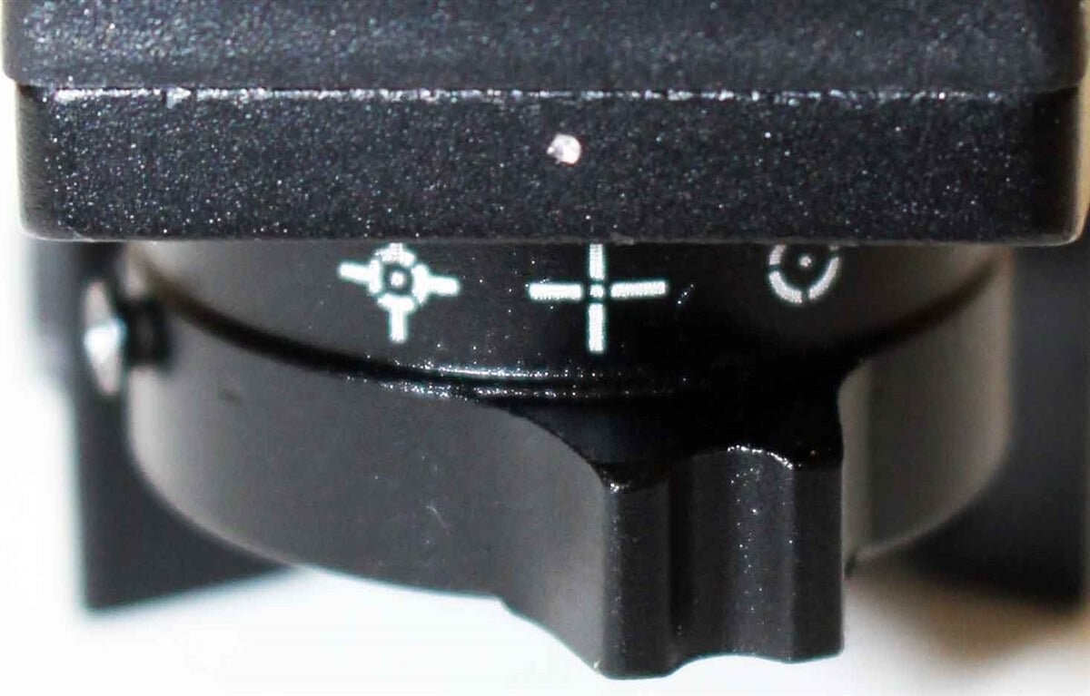 Mossberg 500 12 gauge pump picatinny rail shell carrier and reflex sight combo.