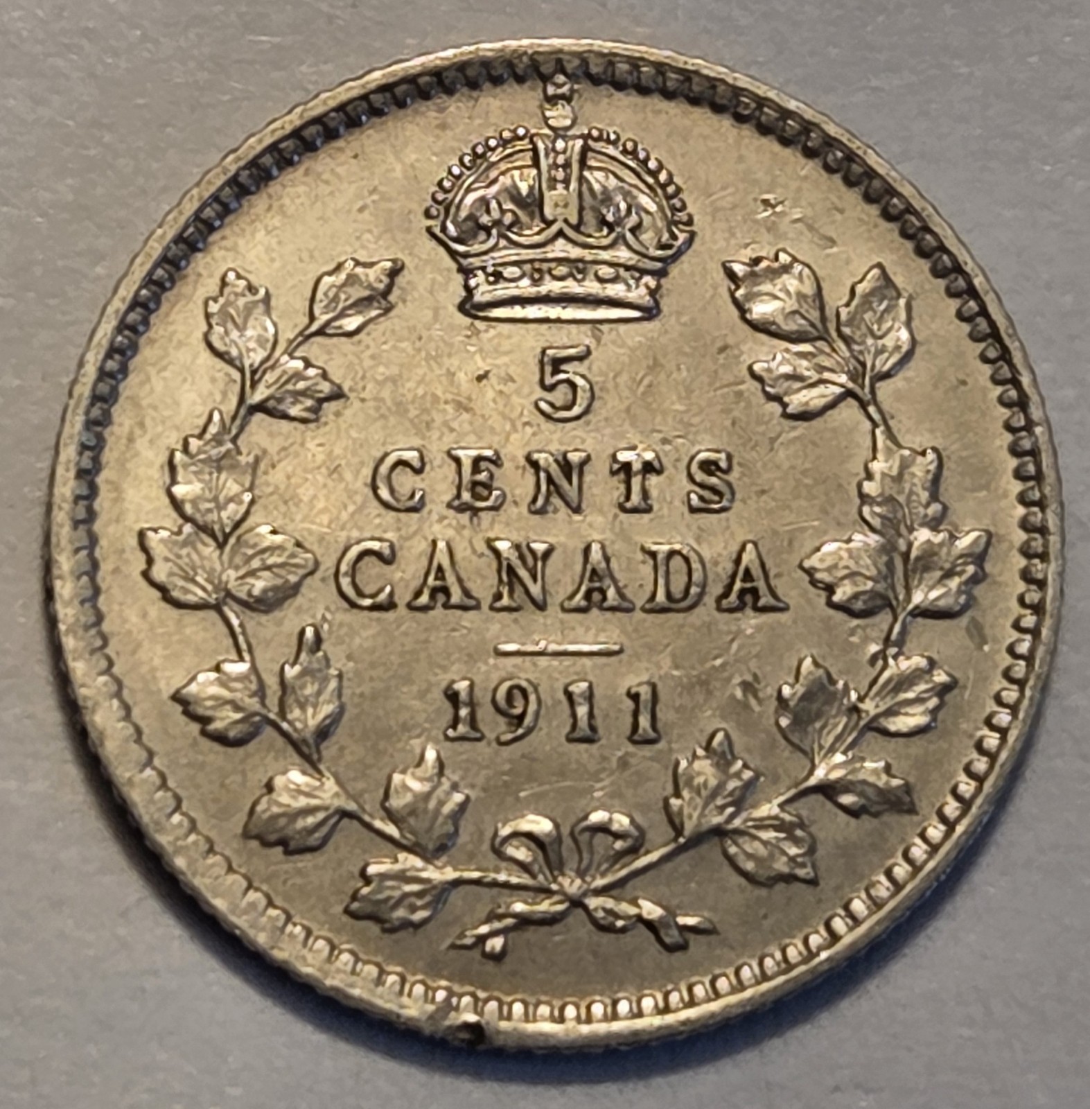 About Uncirculated nicer Low Mintage 1911 Canadian 5 Cents Canada, cleaned