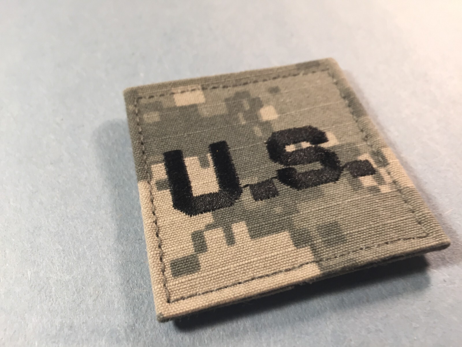 US Army Officers "US" cloth 1 pc (hooks)