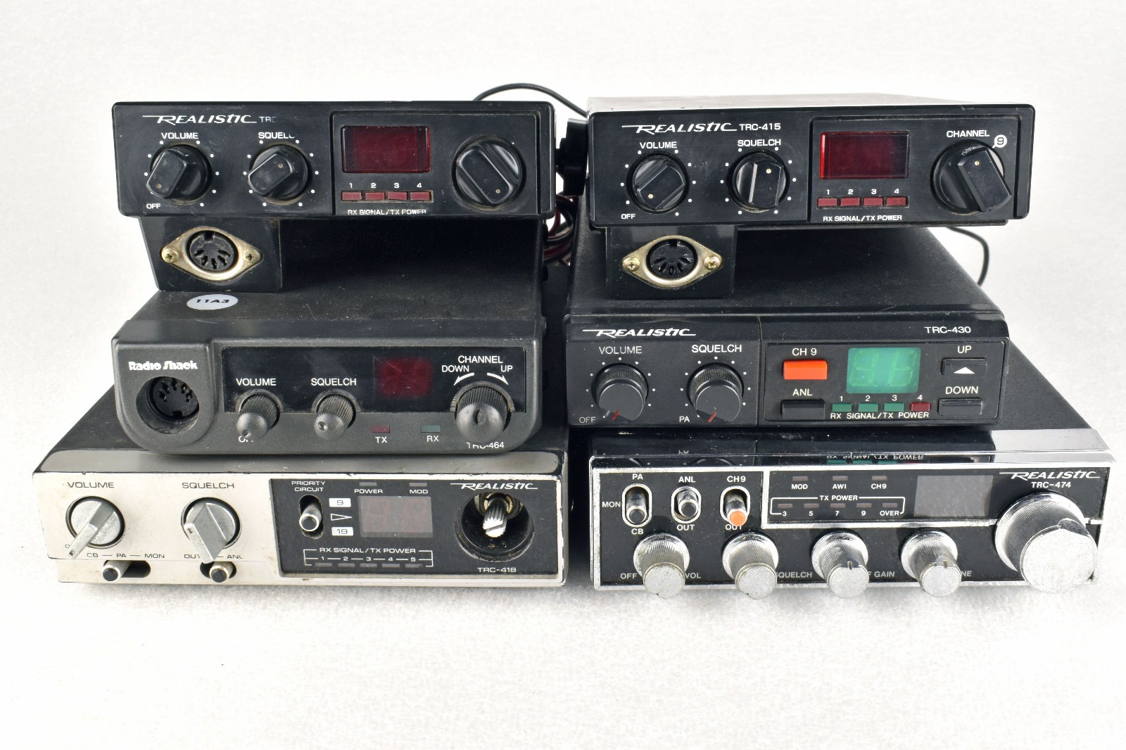 Lot of EIGHT Realistic CB Radio Transceivers POWERS ON / UNTESTED OTHERWISE