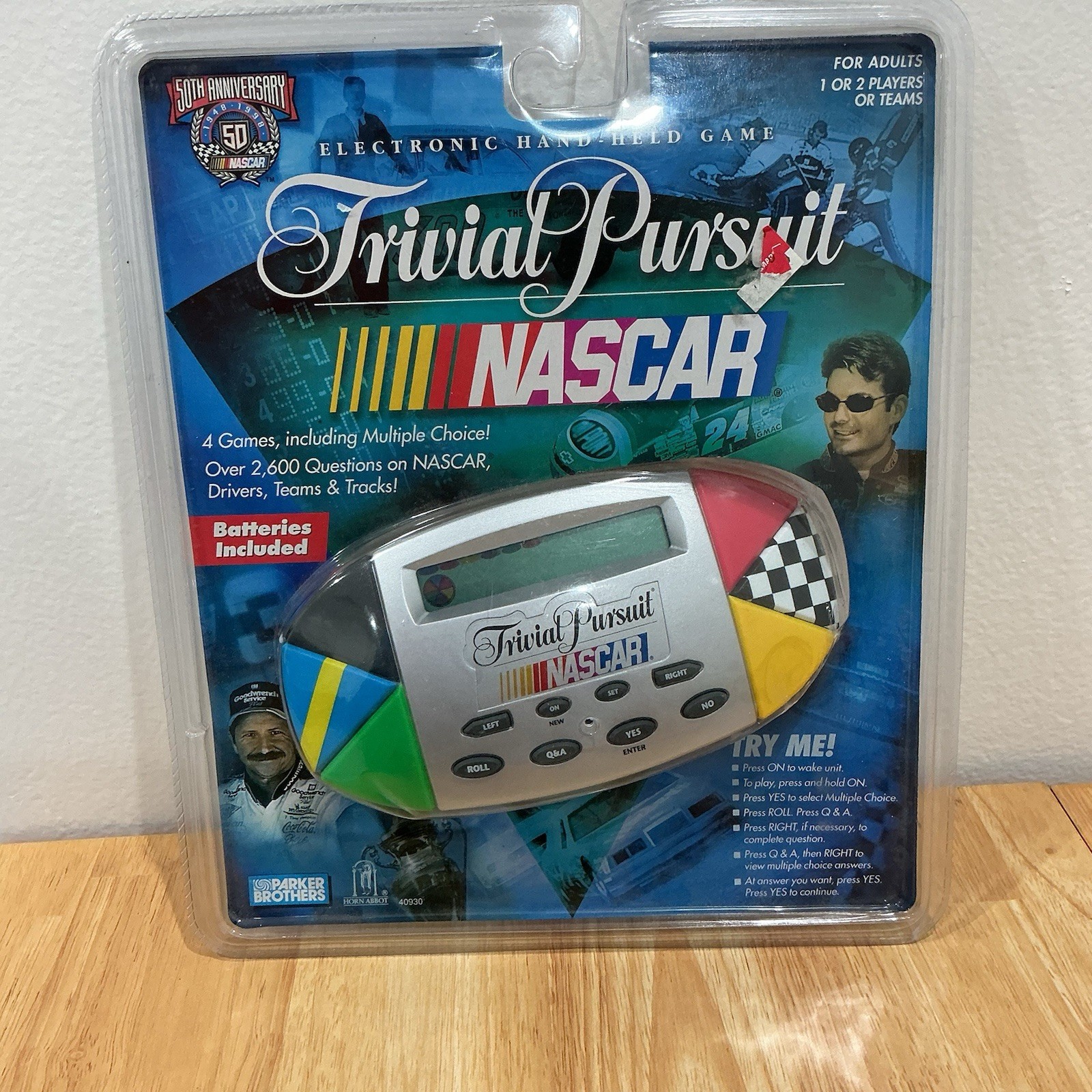 Trivial Pursuit NASCAR Handheld Game. New In Package.