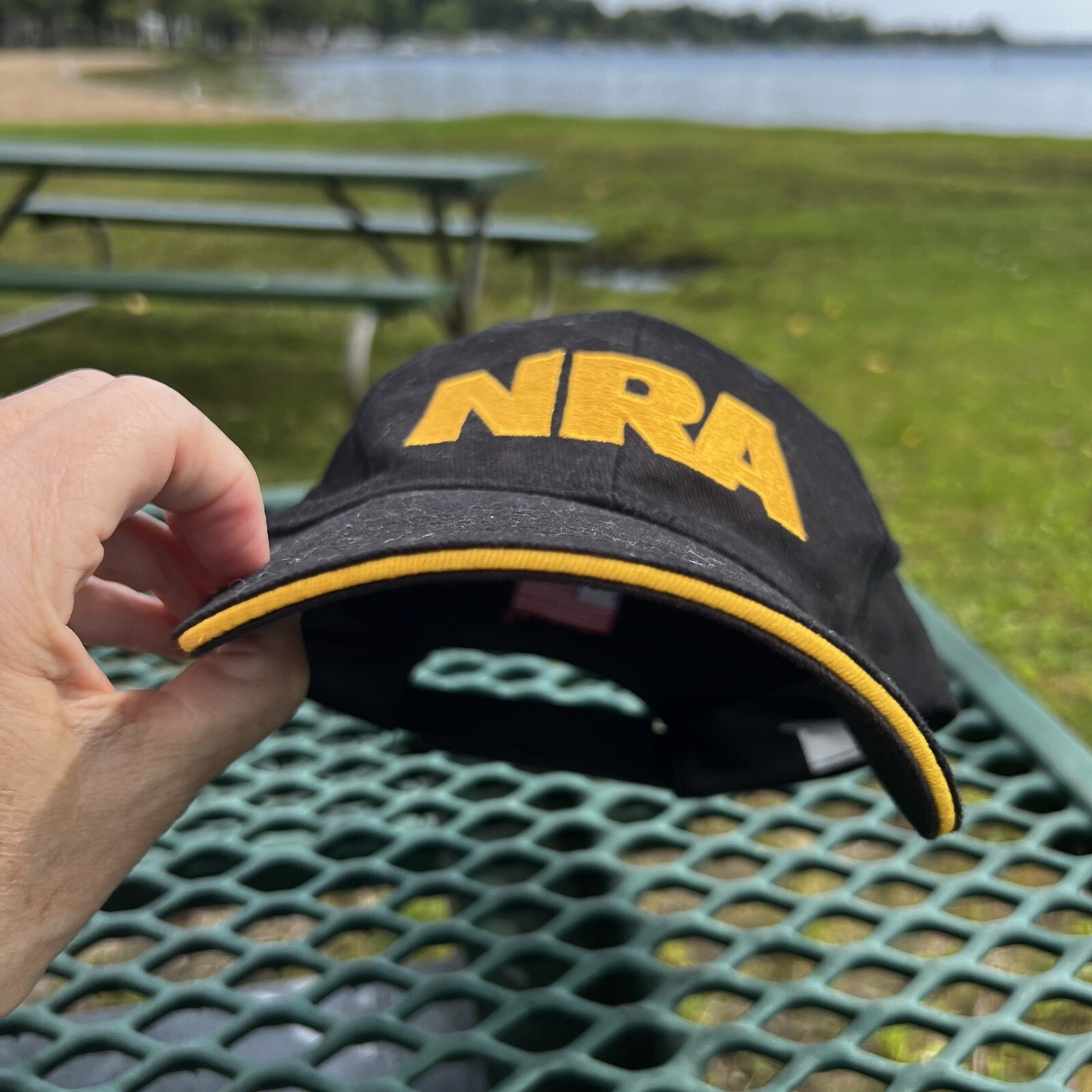 NRA Gold Letters on Black Hat Cap w Gold Bill Edge Hook Loop American Flag EUC