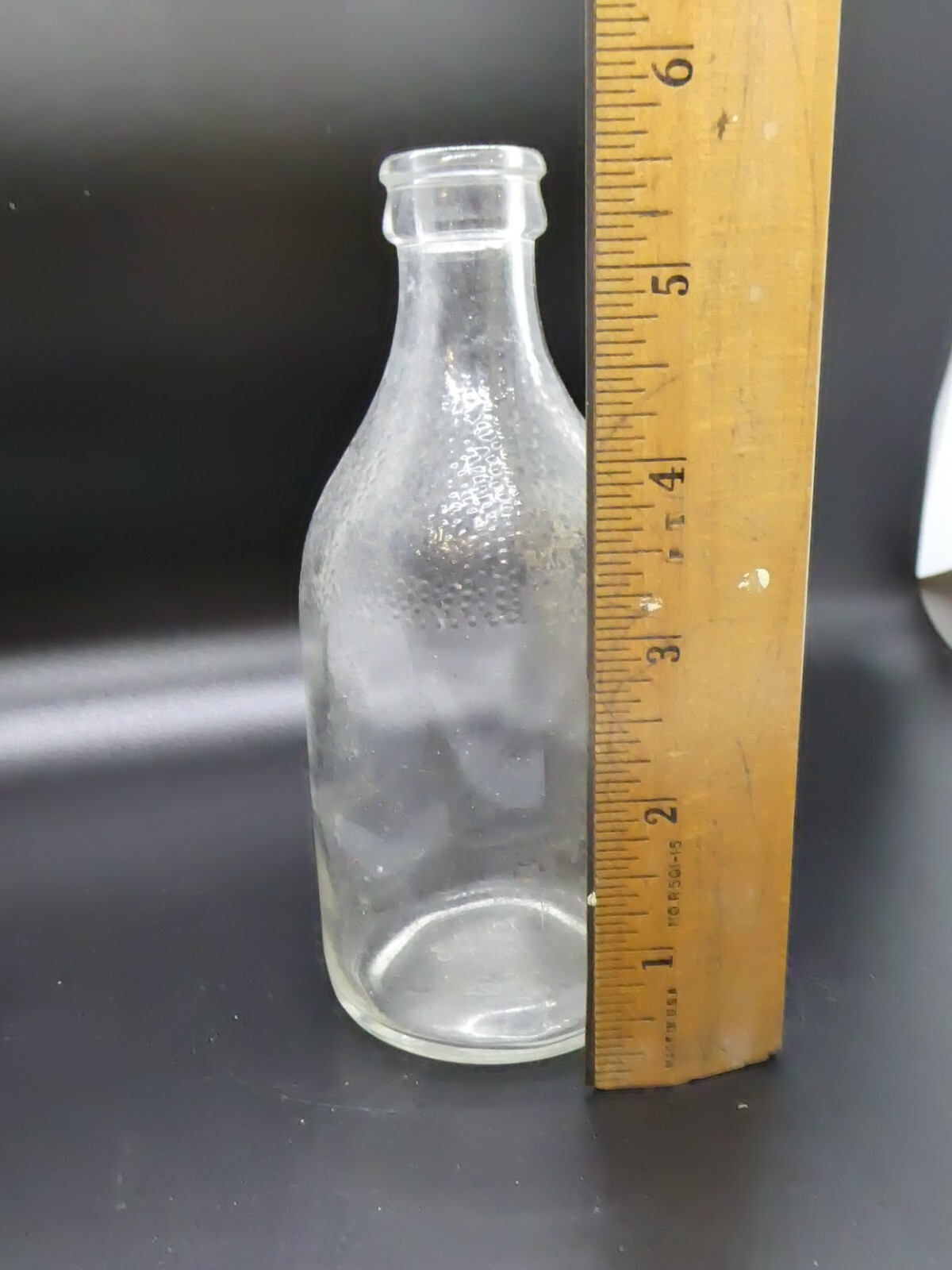 Vintage Small Clear Glass Bottle Patterned on Top 5.5" x 2"