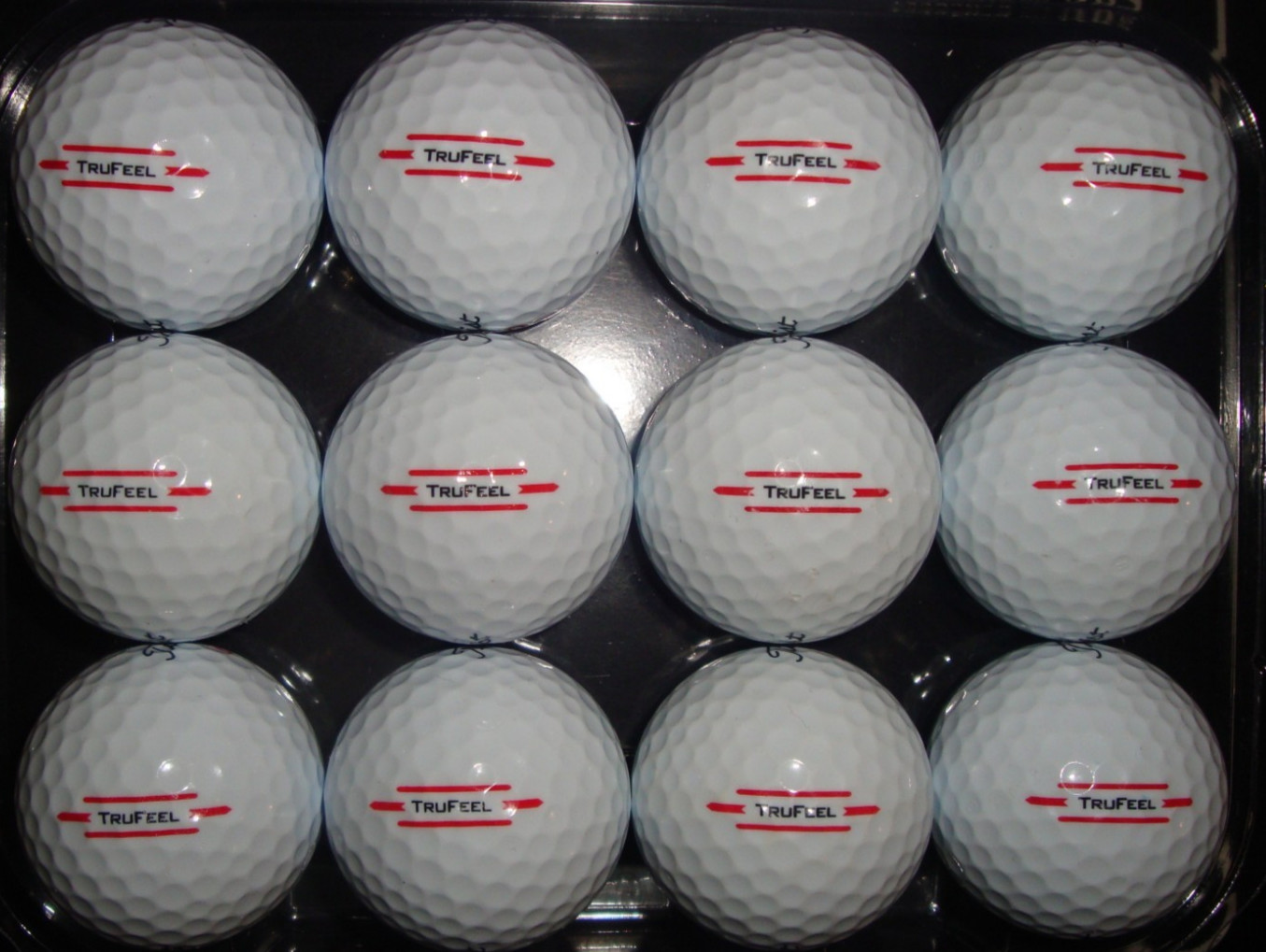 12 Titleist TruFeel golf balls