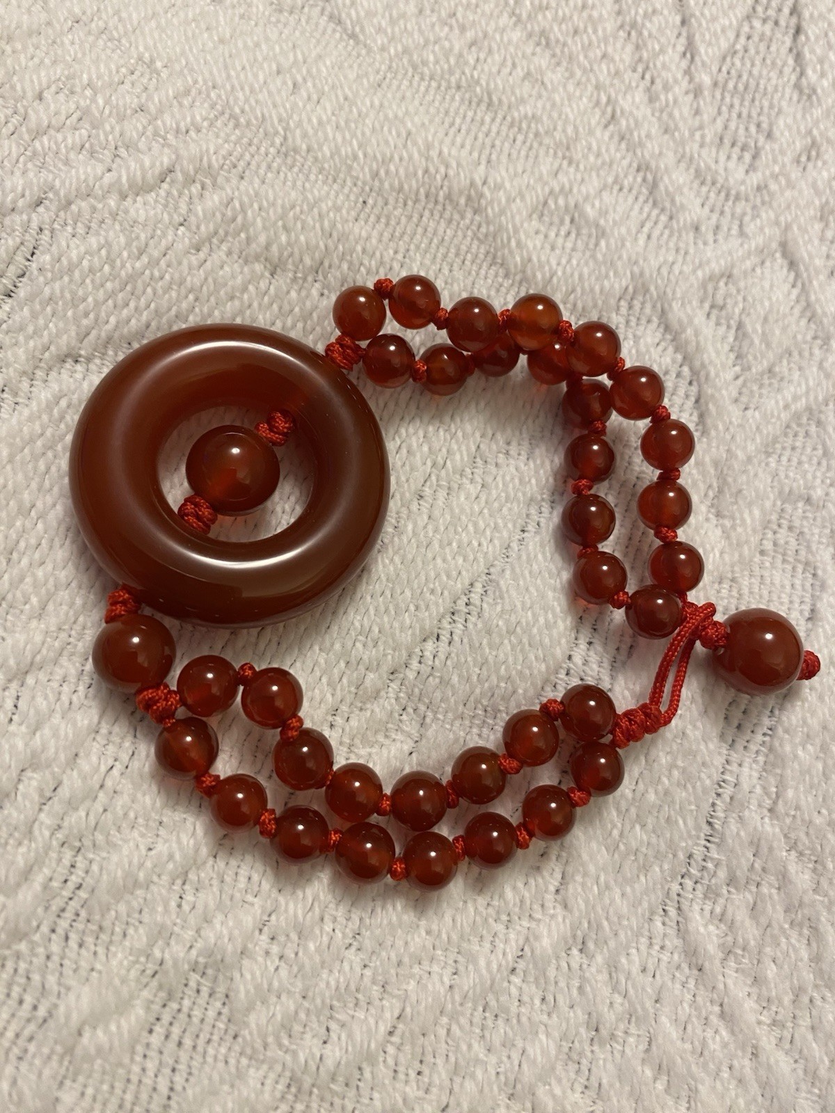 Carnelian Beaded Bracelet With Large Stone In The Center Hand Knotted