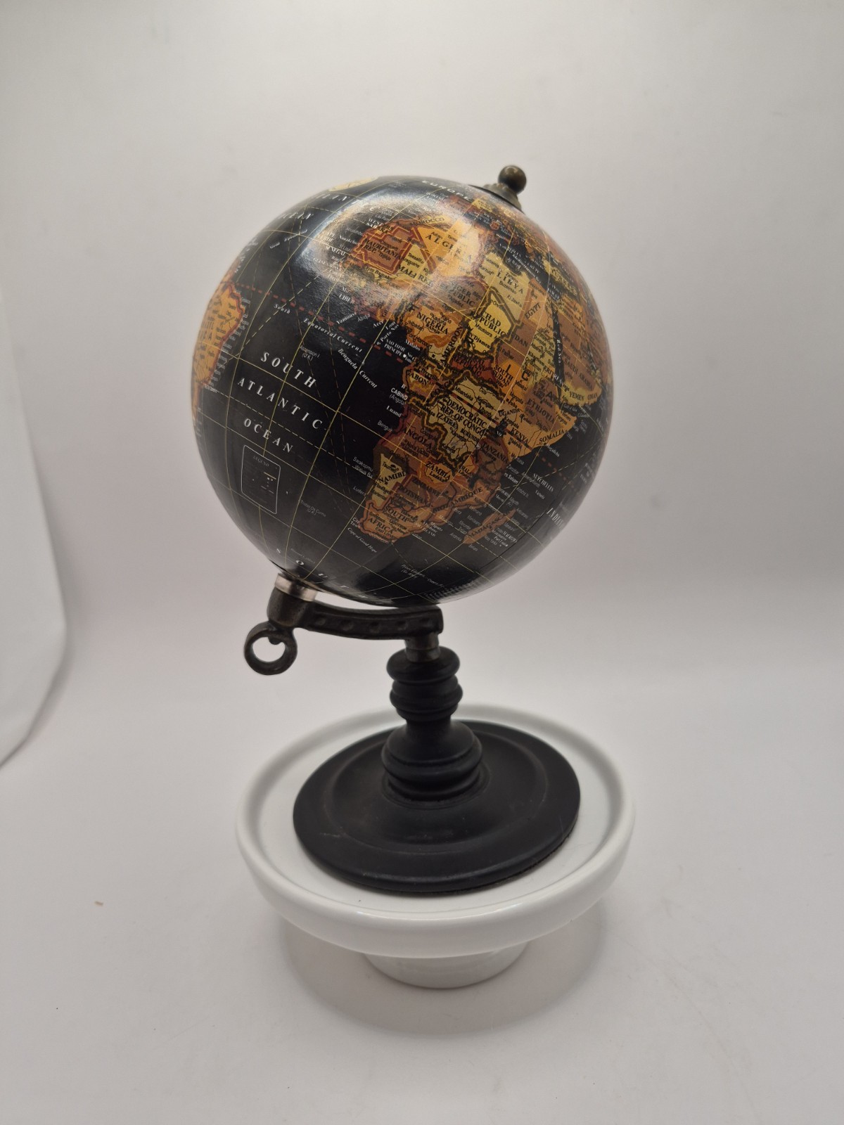 A Classic Vintage Desk Top Rotating Globe on Stand Black Ocean Design