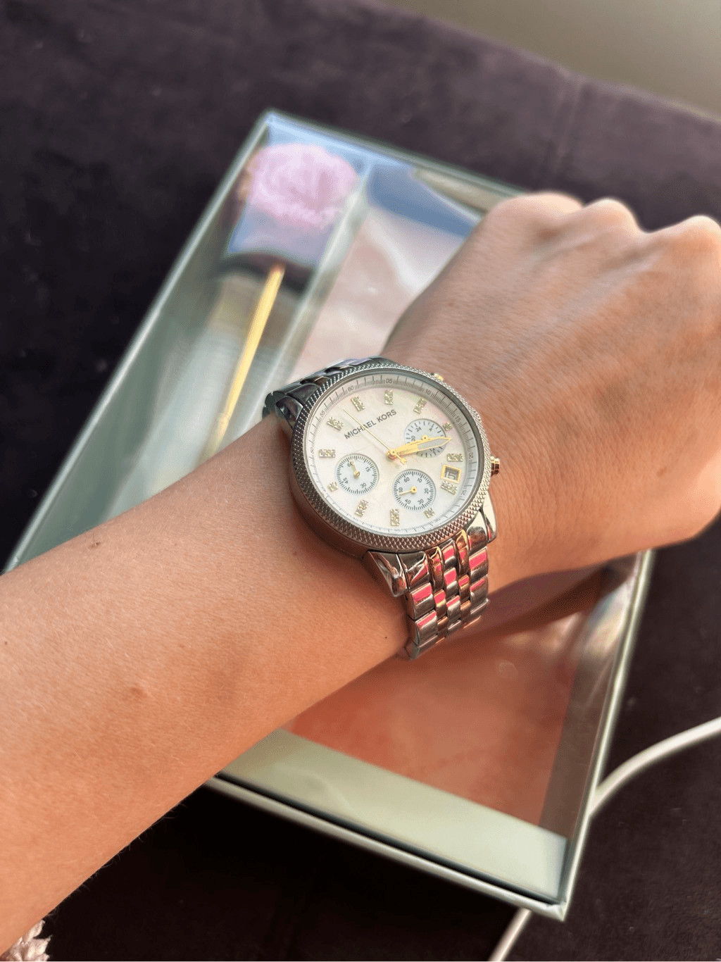 Michael Kors silver and gold watch with little diamonds inside