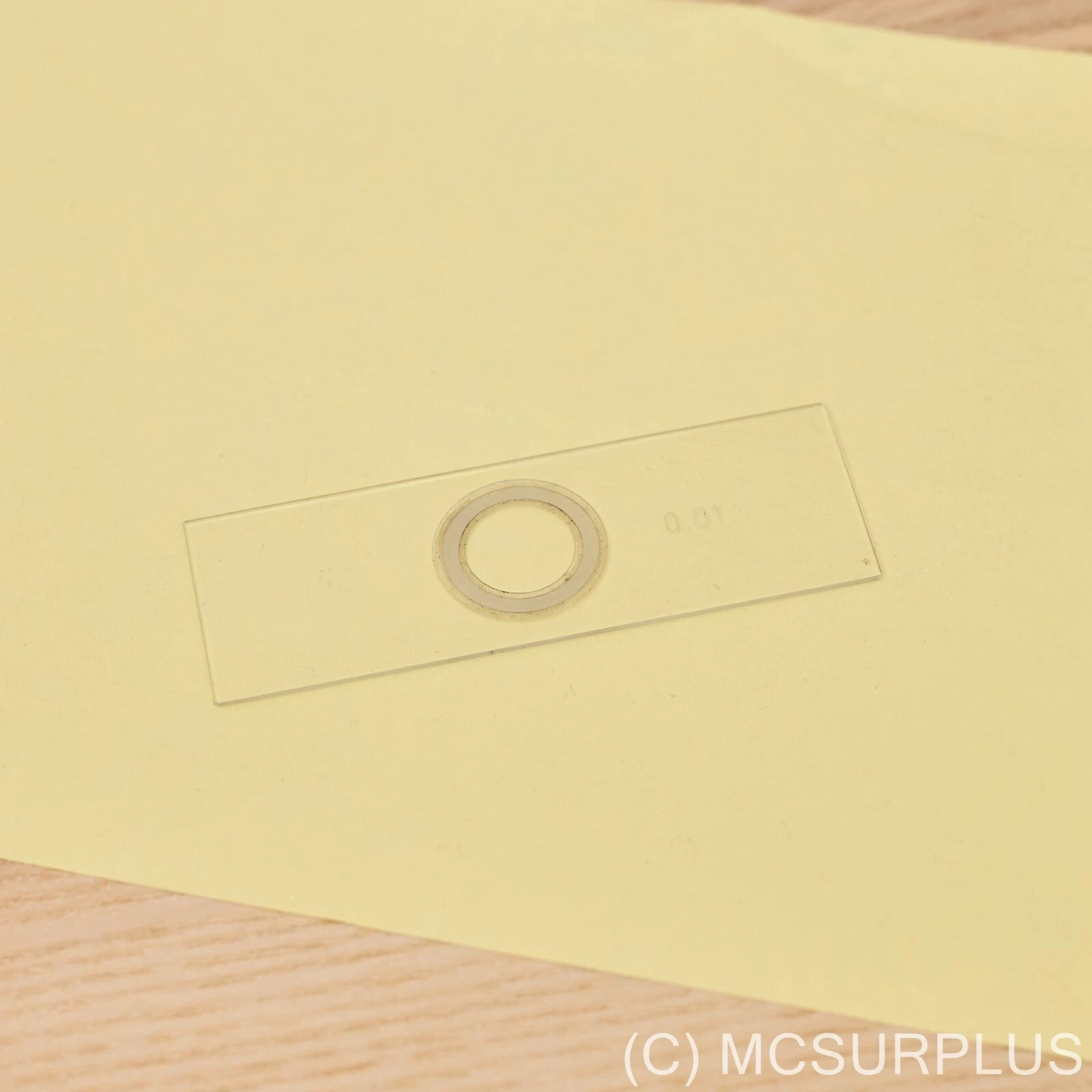 Russian microscope stage micrometer target, with cover glass