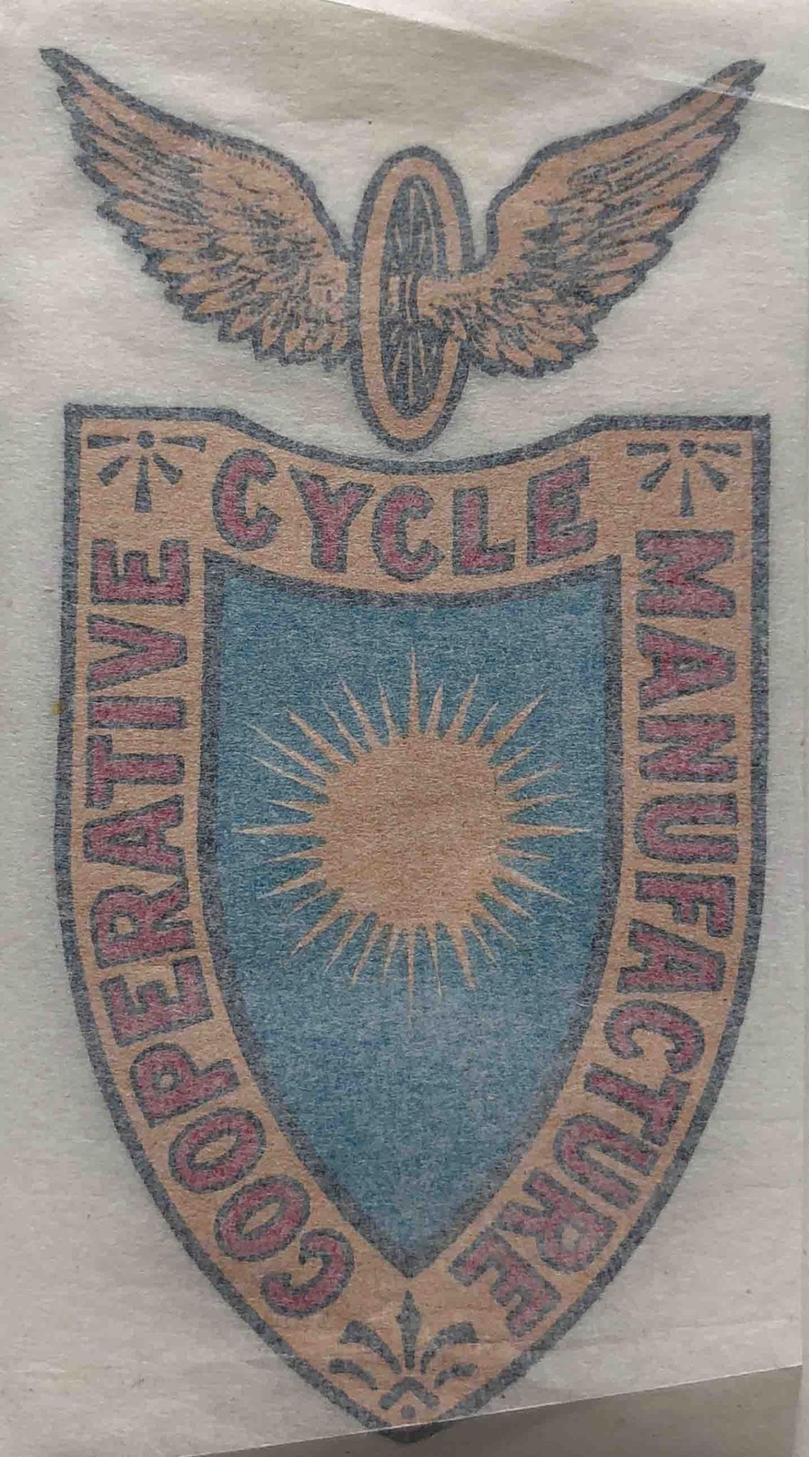 CO-OP shield with winged wheel