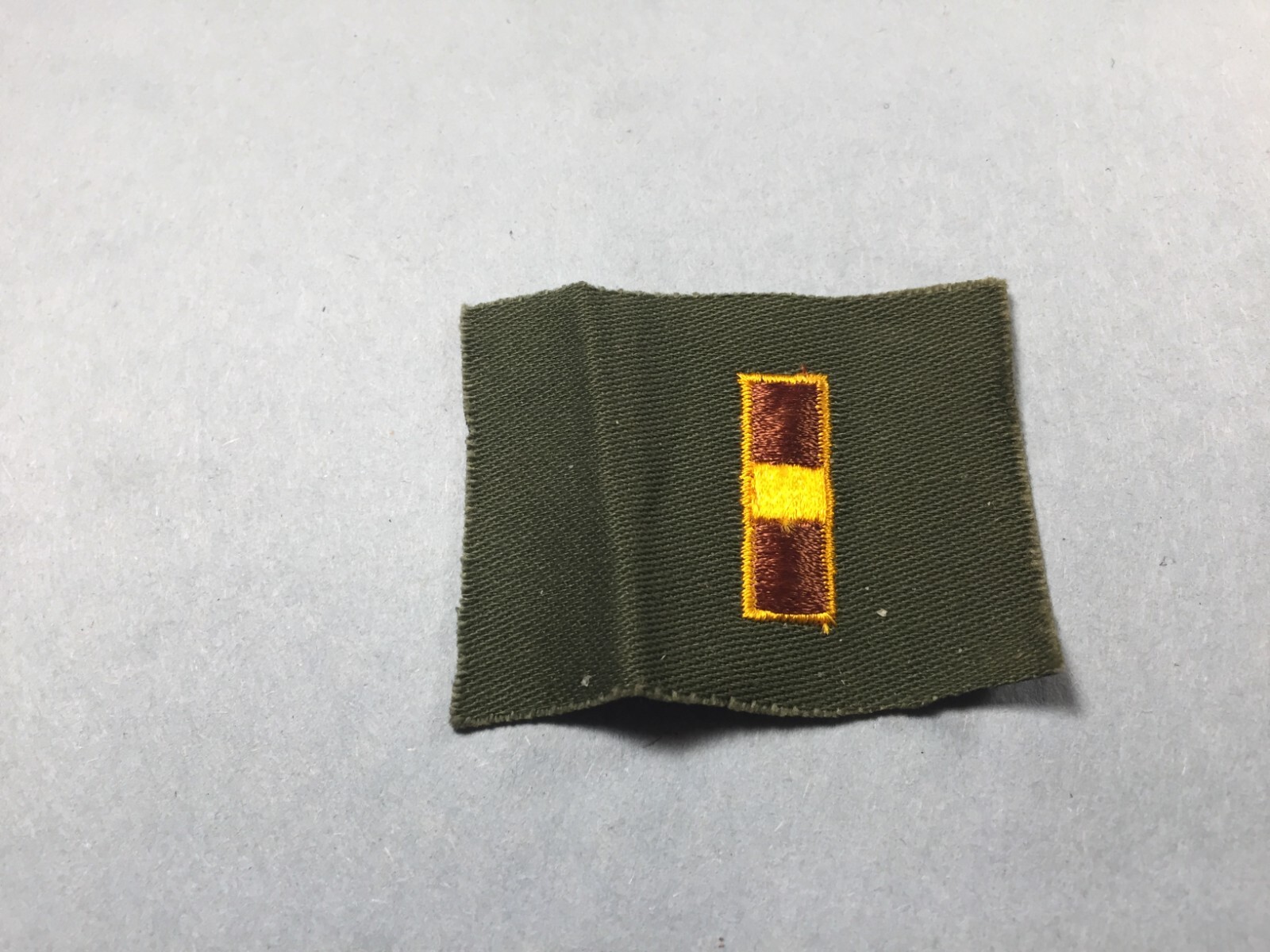 US Army -WO 1 (on green cloth, sew-on) Rank (1 pc)