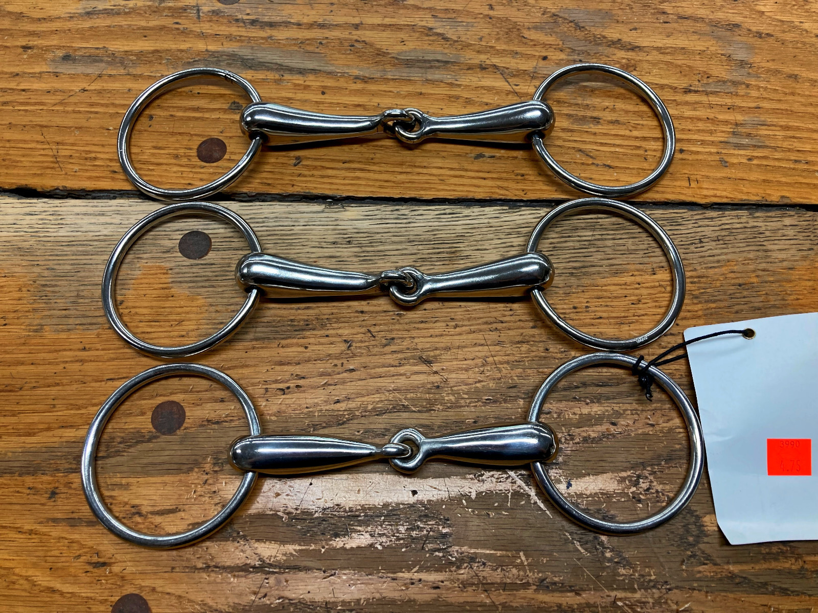 THREE SMITH WORTHINGTON LOOSE RING SNAFFLE BITS(4 3/4" - 5" - 5 1/4")