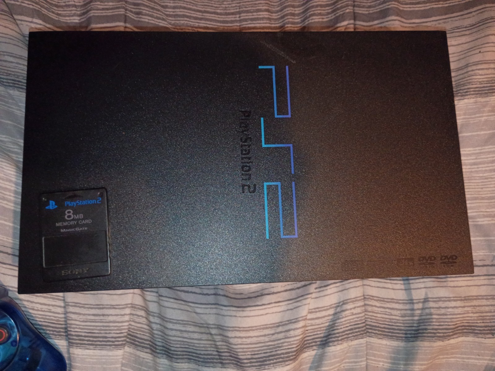 Sony PlayStation 2 Black Phat Model. Comes with Everything Needed to Play.