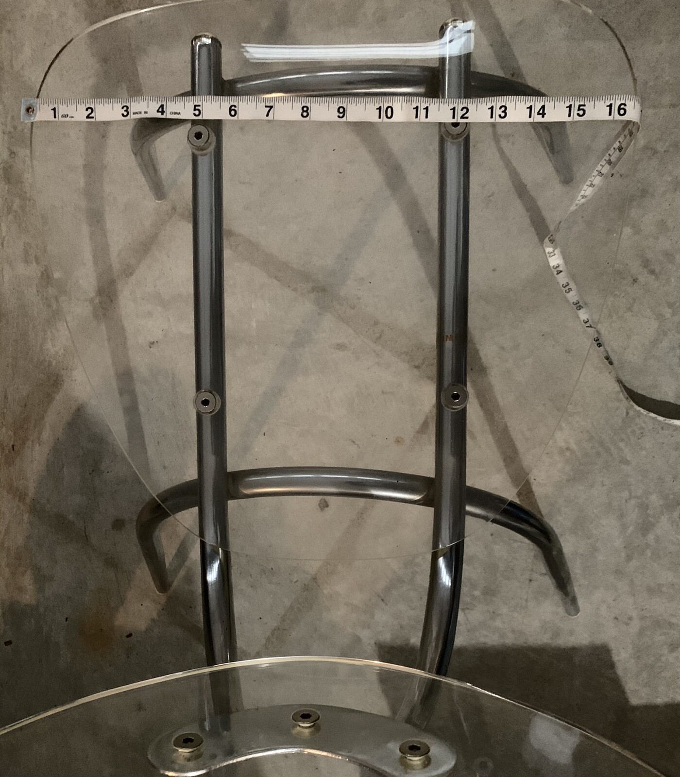 Contemporary acrylic and steel chair. Artsy!
