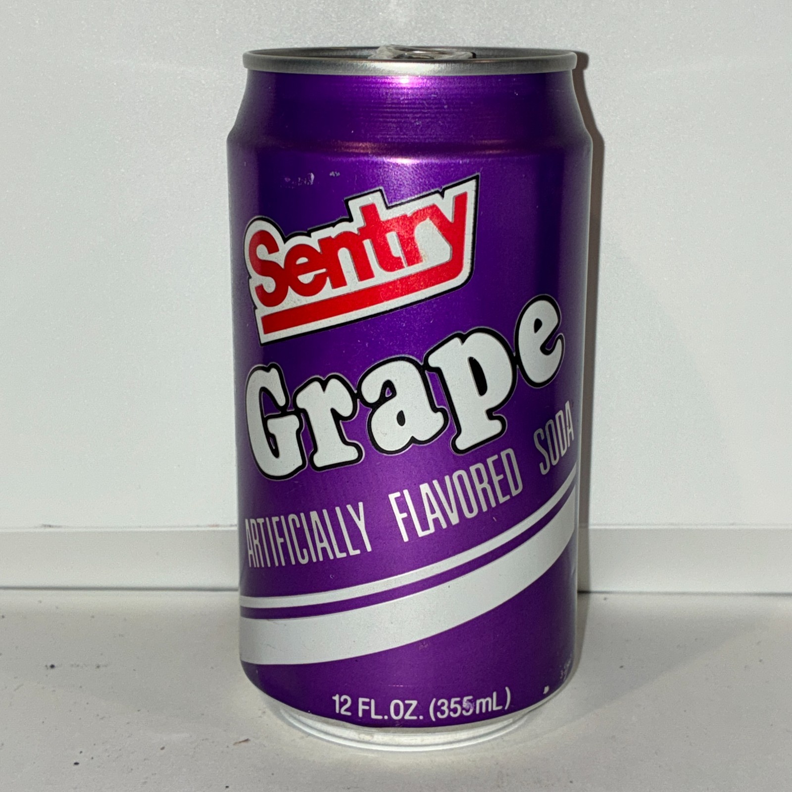 Sentry Grape soda can