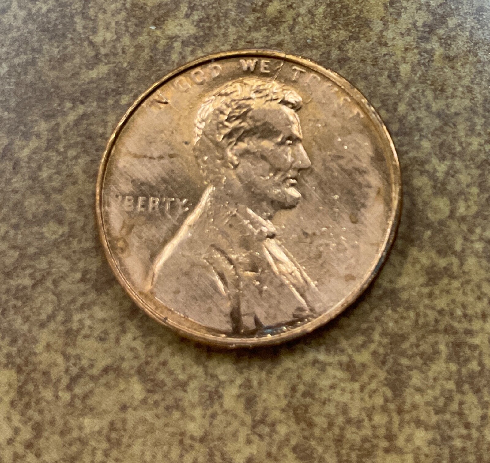 1983 Lincoln cent struck thru or die adjustment ERROR.