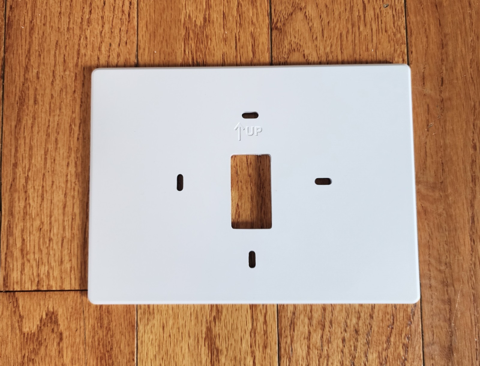 UNIVERSAL THERMOSTAT WALL PLATE PRO 1 MODEL T119 VERTICAL TO HORIZONTAL