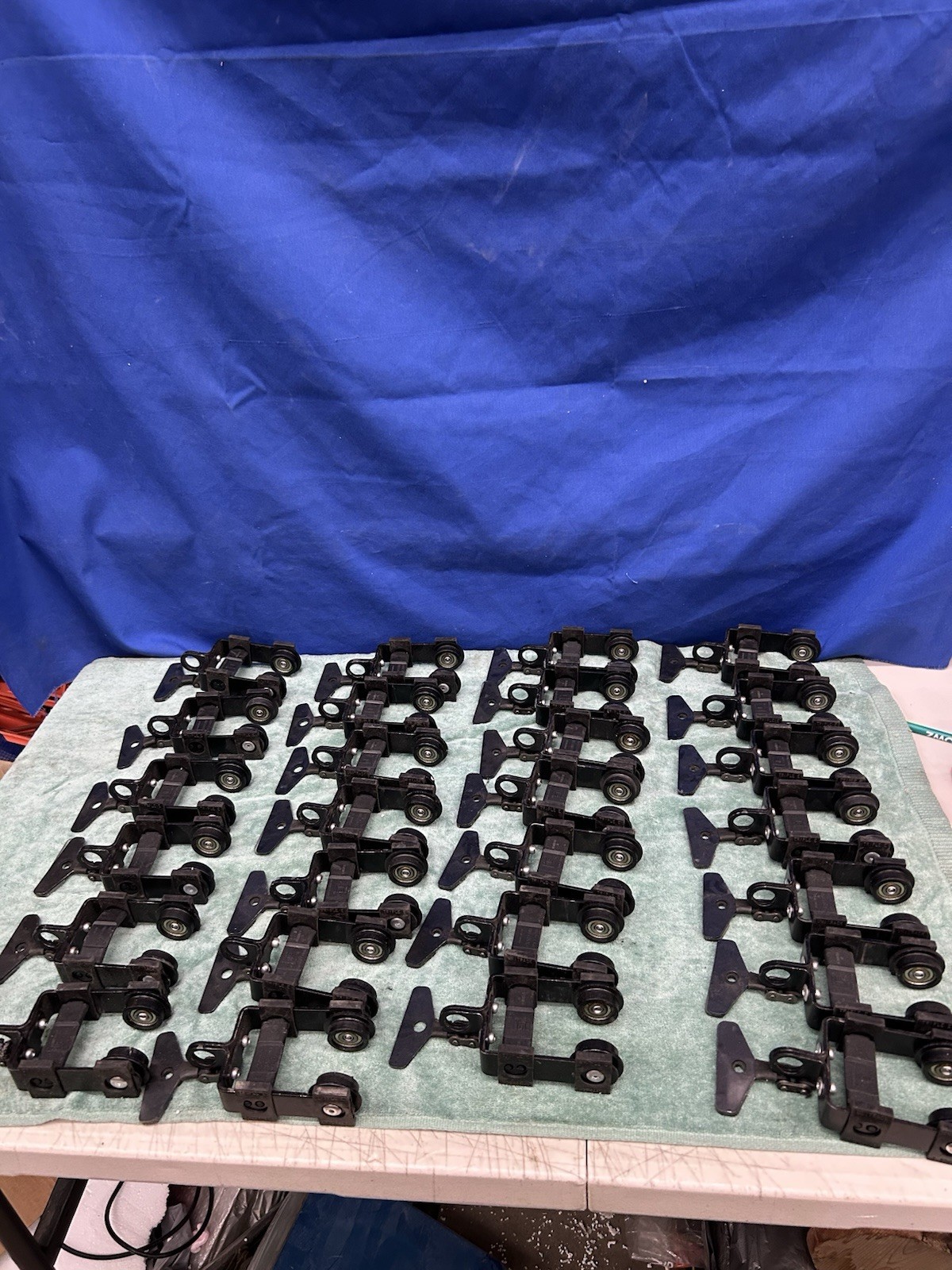 Lot of 28 Triple E 2-Wheel Carrier's for Unitrack More lots available