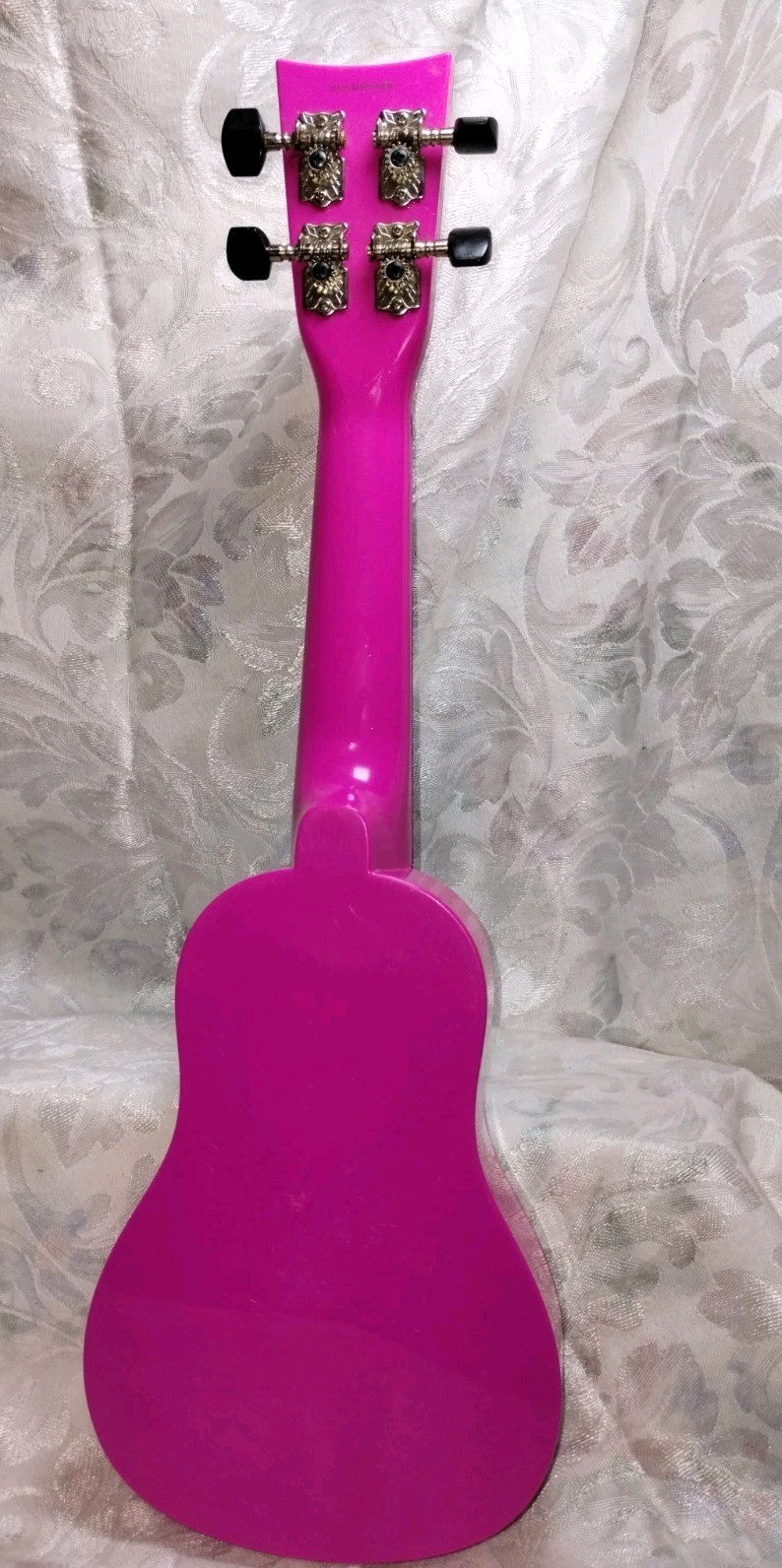 First Act Discovery Shimmer and Shine soprano toy ukulele.