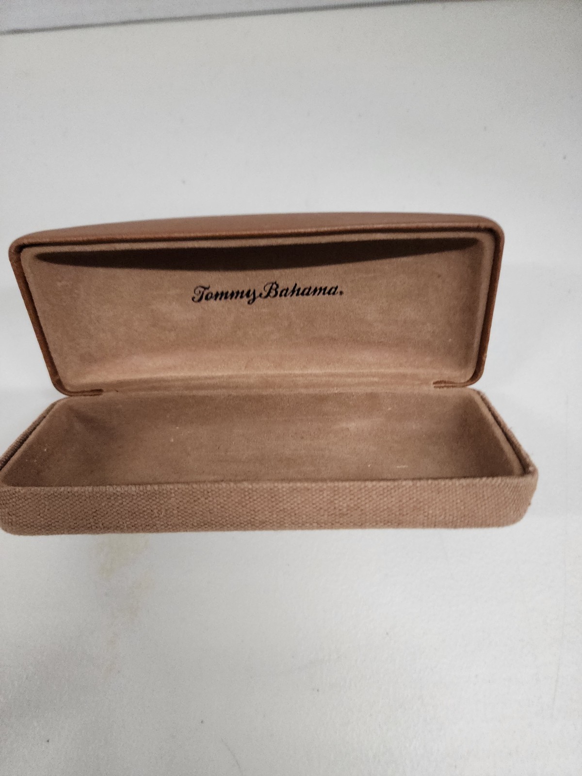 brown leather and canvas Tommy Bahama clamshell hard eyeglass case.