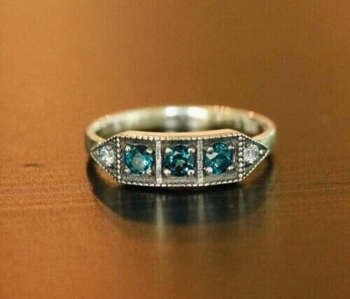2Ct Round Cut Lab-Created Blue Topaz Unique Wedding Ring 14K White Gold Plated