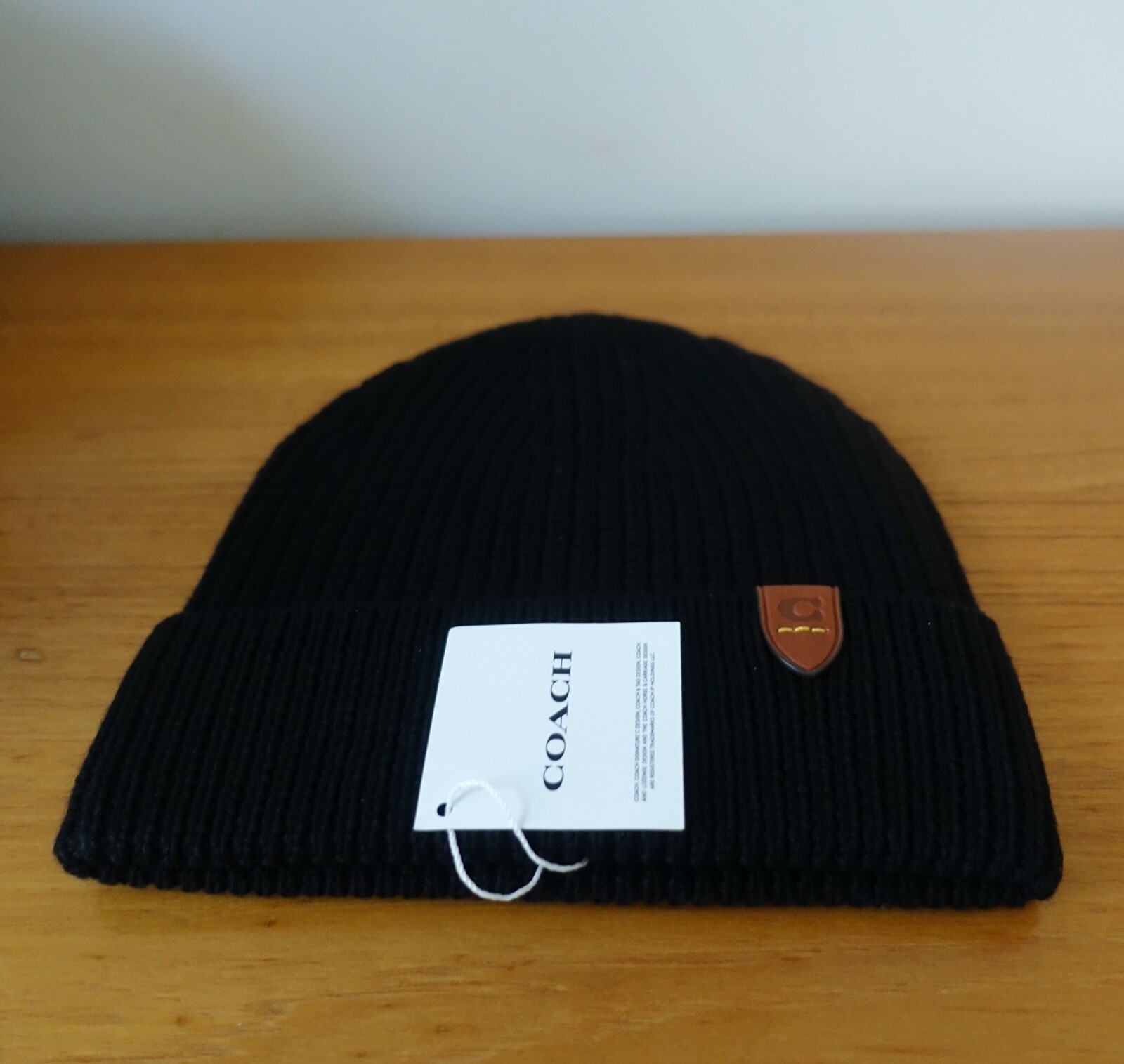 COACH HAT KNIT WOOL BEANIE IN BLACK COLOR . NWT