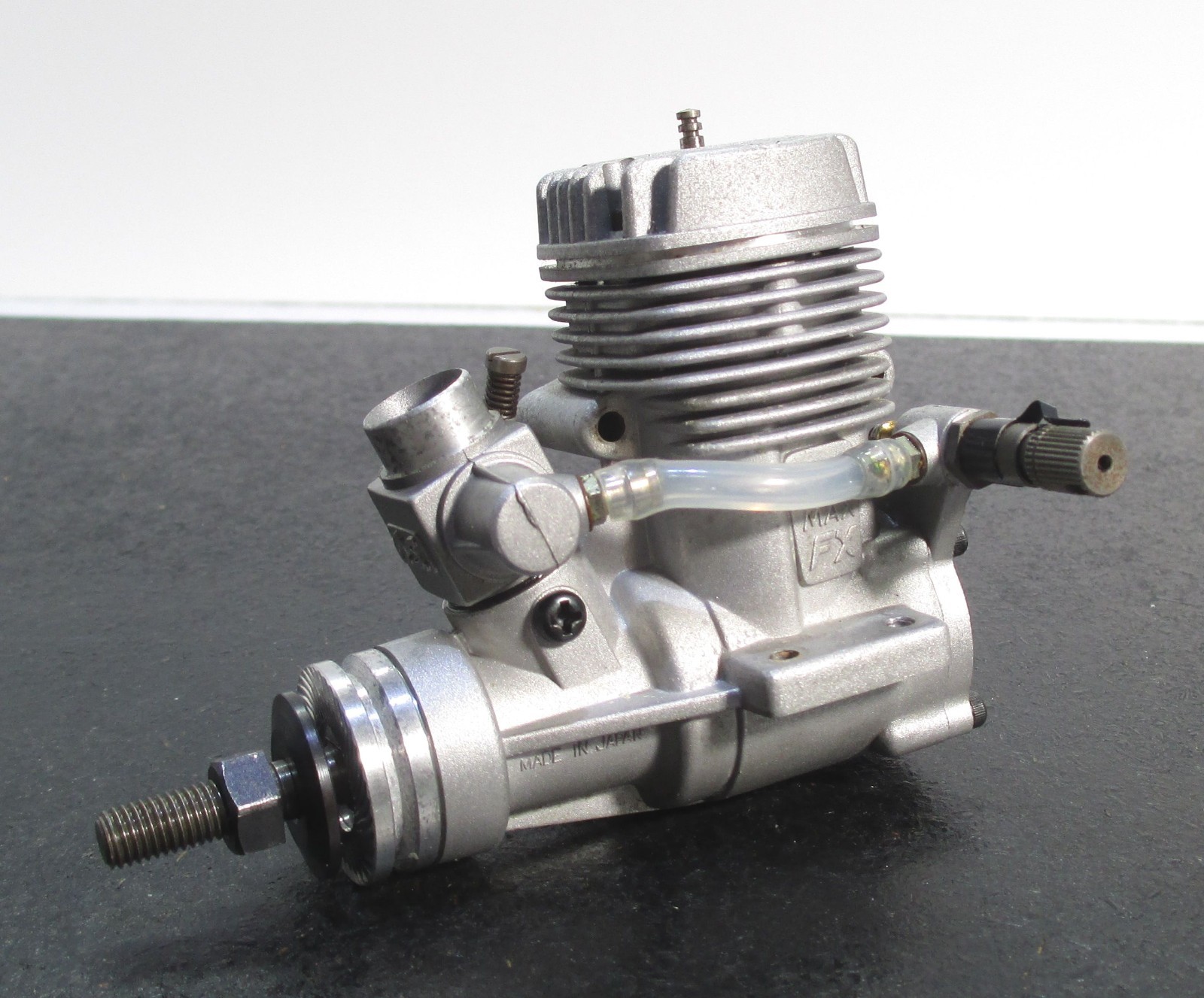 O.S. MAX-25FX 4.07cc 2-Stroke Glow Engine Includes muffler; used for RC airplane