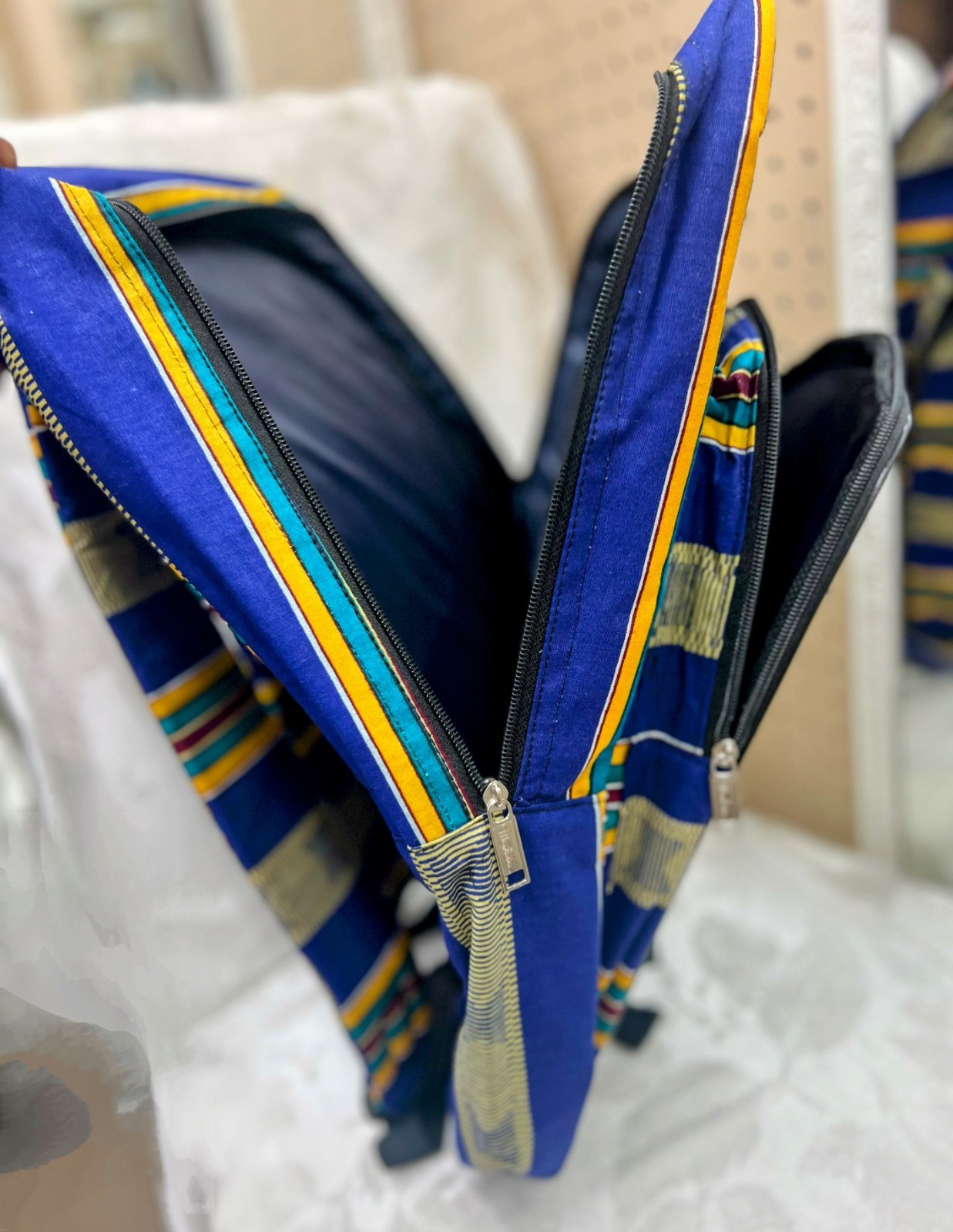 Padded Blue Kente Backpack with multi pockets, inside lining & Padded Straps