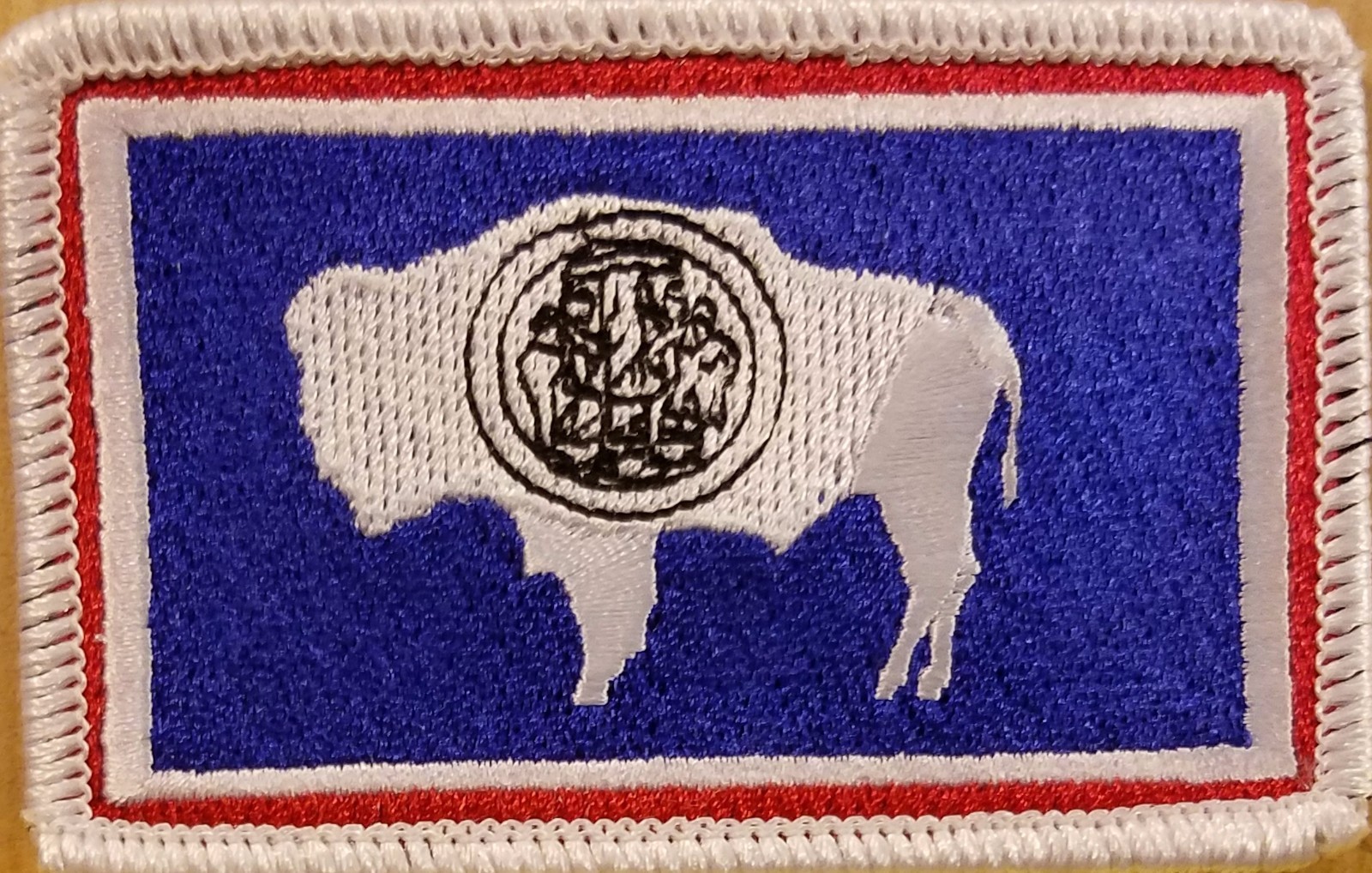 WYOMING Flag Tactical Patch W/ Hook Adhesive Fastener Morale Emblem White Border
