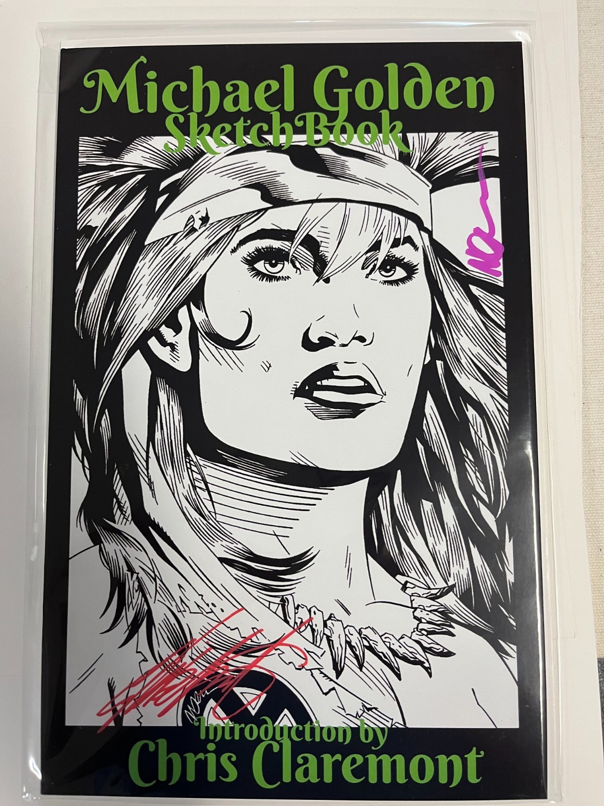 michael golden sketchbook, intro: Chris Claremont. signed: Claremont & Golden