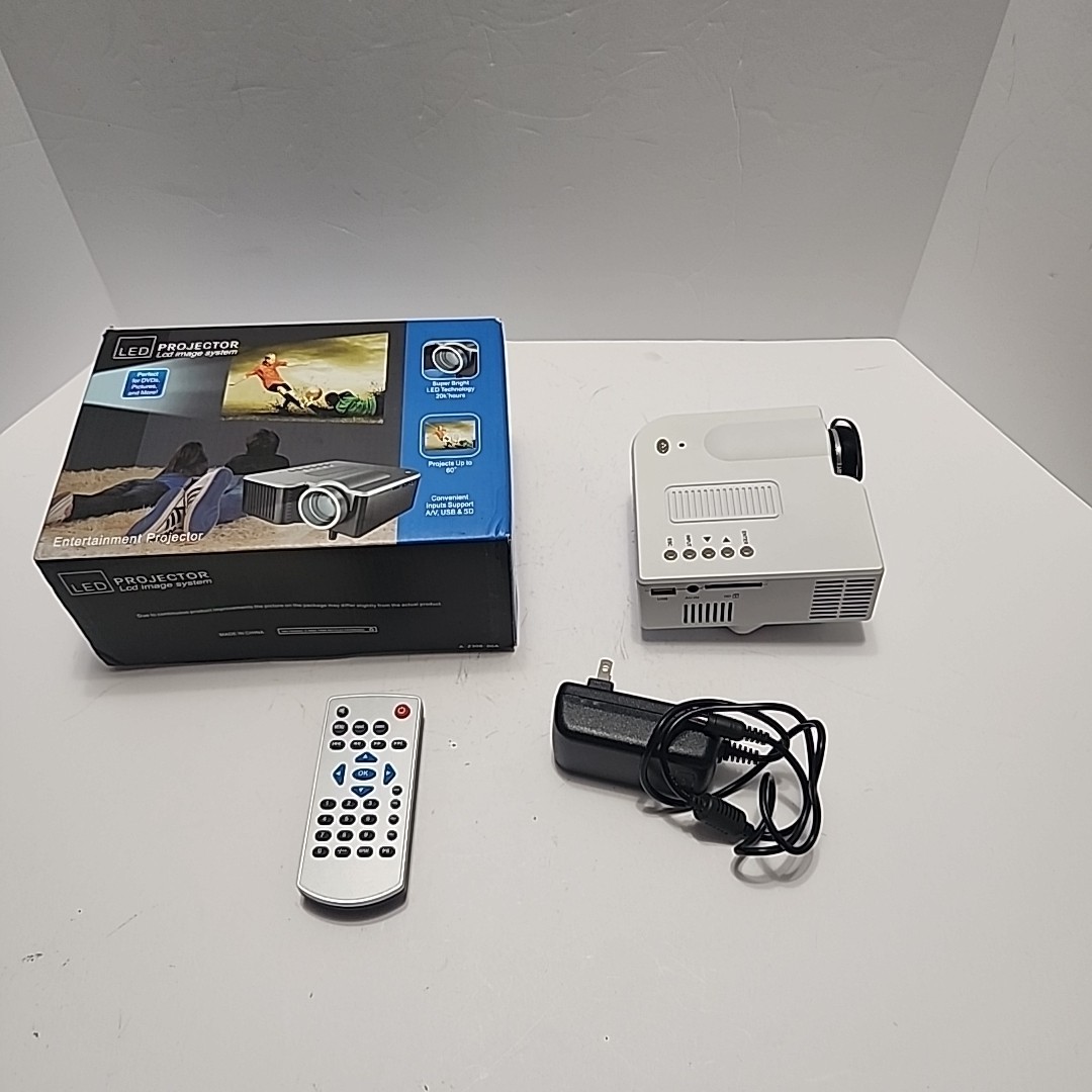 LED Entertainment Projector LCD Image System Projects Up To 60" (Portable Mini)