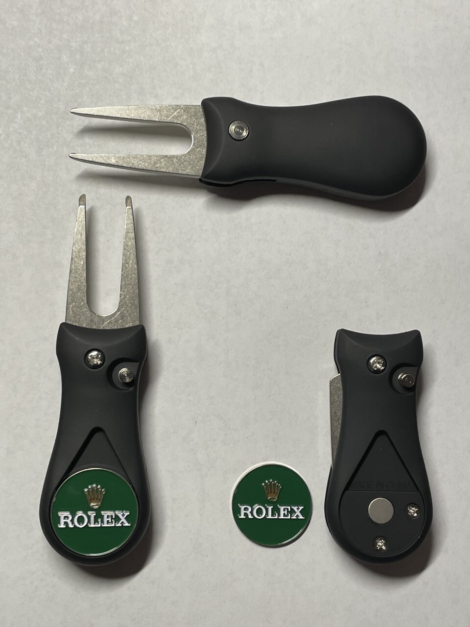 (1) Switchblade Golf Divot Tool & (1) Rolex 1" Coin Style Golf Marker