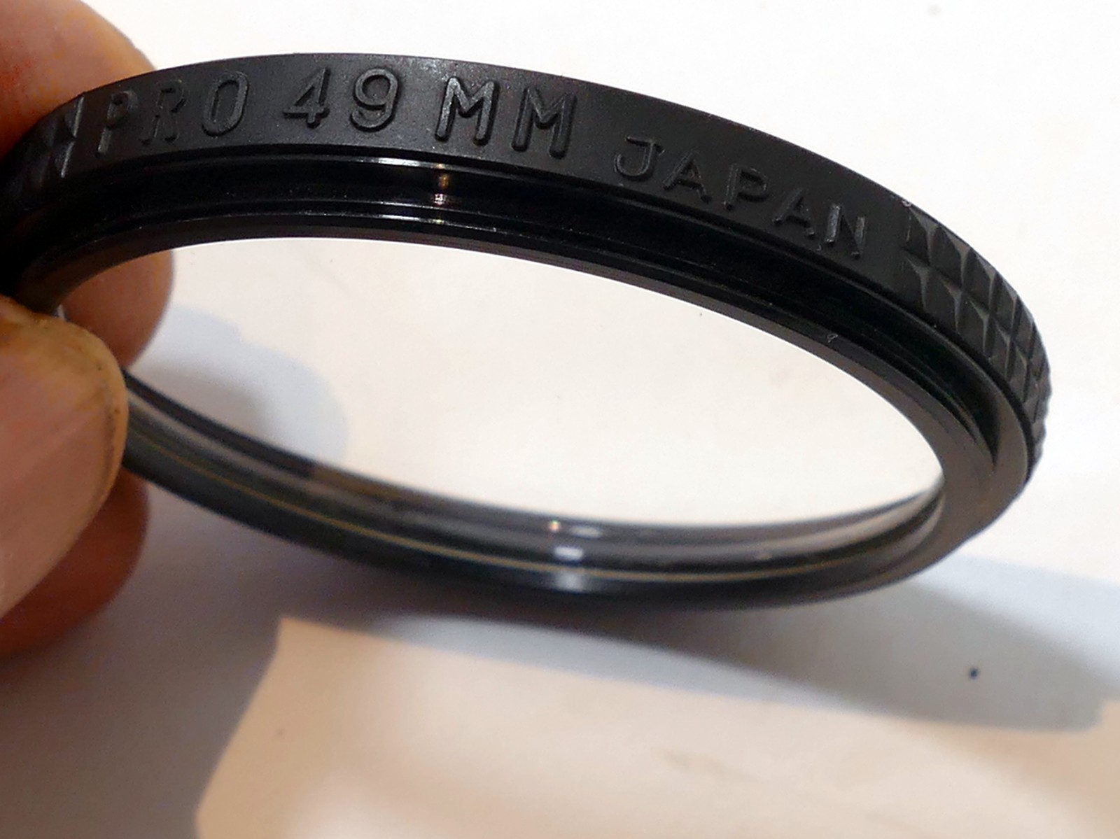 Promaster UV 49mm Filter with rubbered gripper ribbed rim