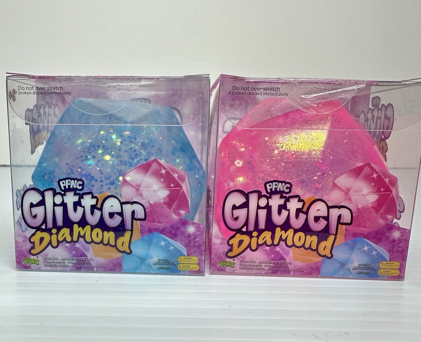 Set Of 2 New Glitter diamond squishy Squish the sparkle (super Rare) viral