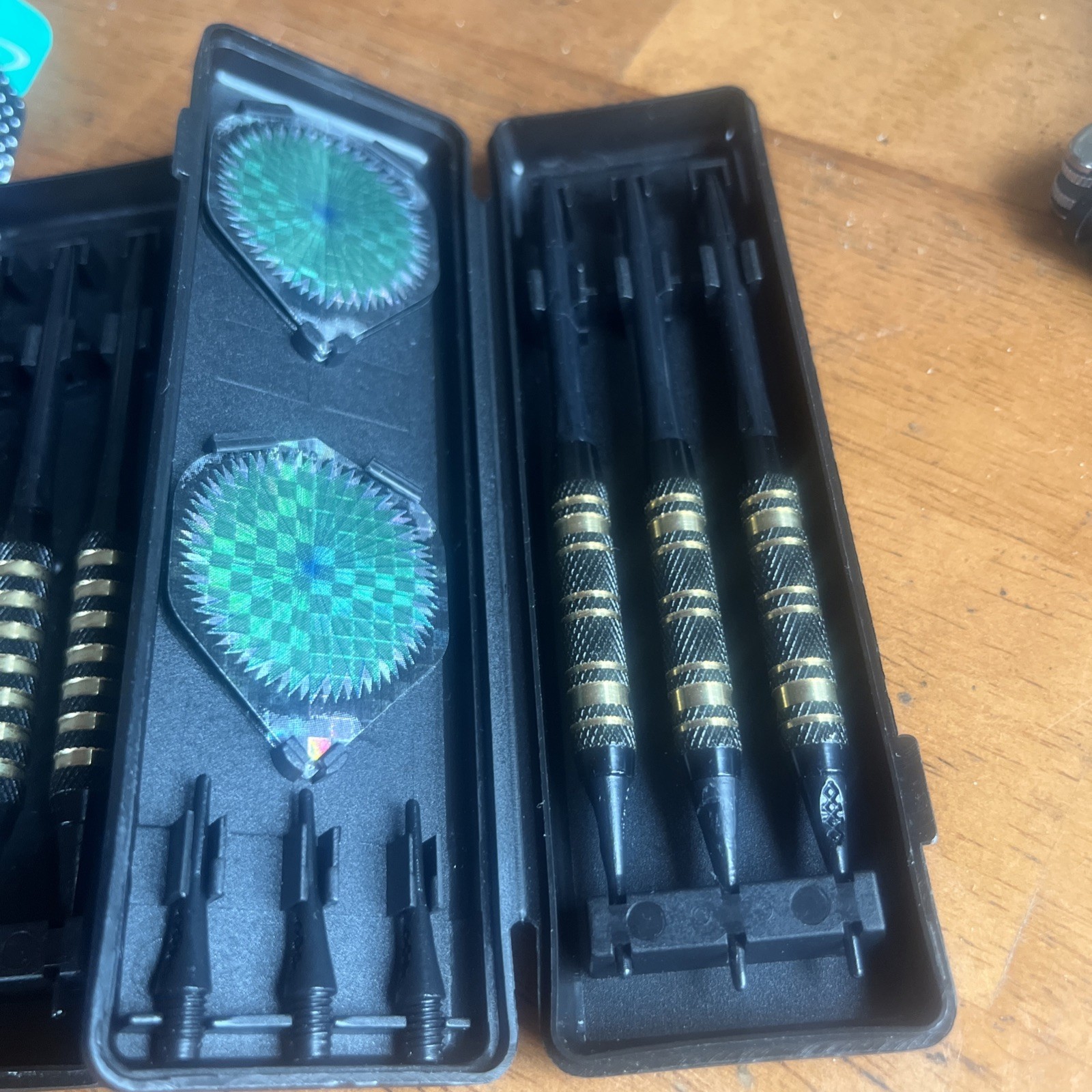 Halex throwing darts with case.  open box but look never used, undated.. 2 Sets