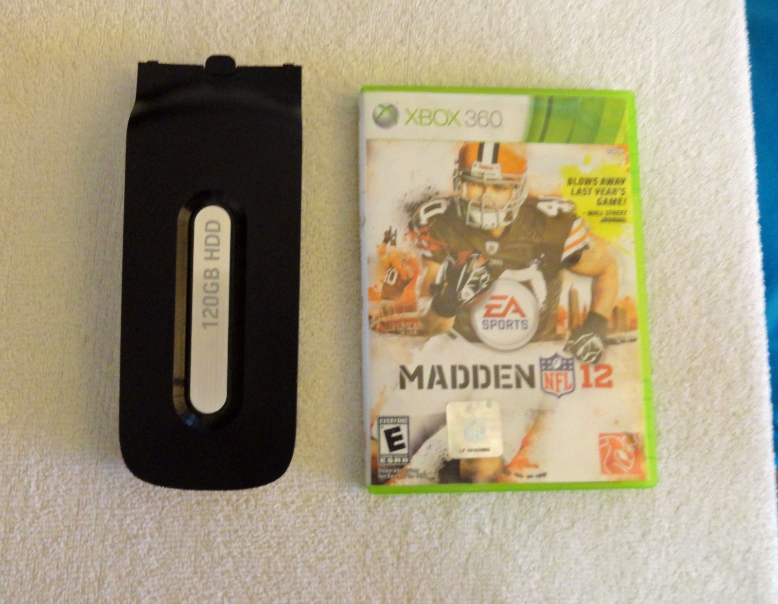 XBOX 360 120 GB hard drive and XBOX 360 Madden 12 Game