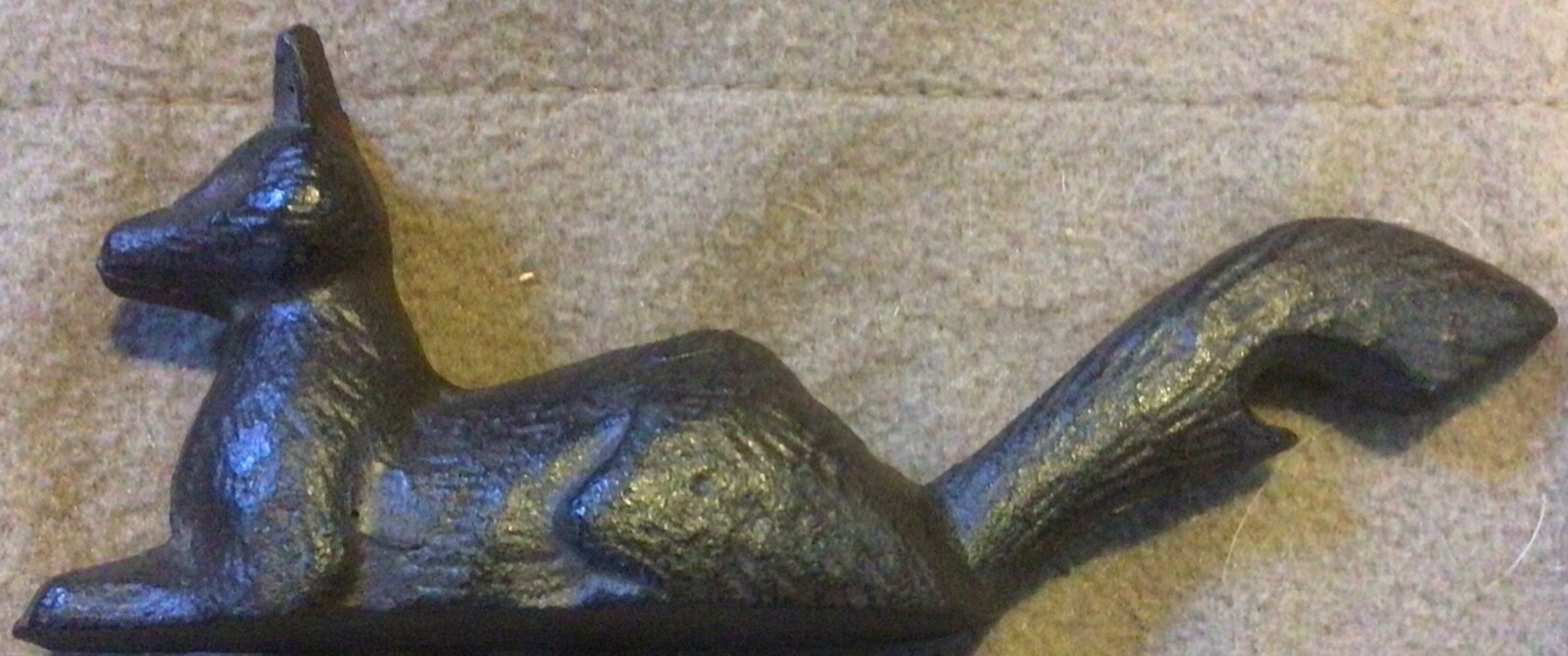 Cast Iron Paperweight and Bottle Opener