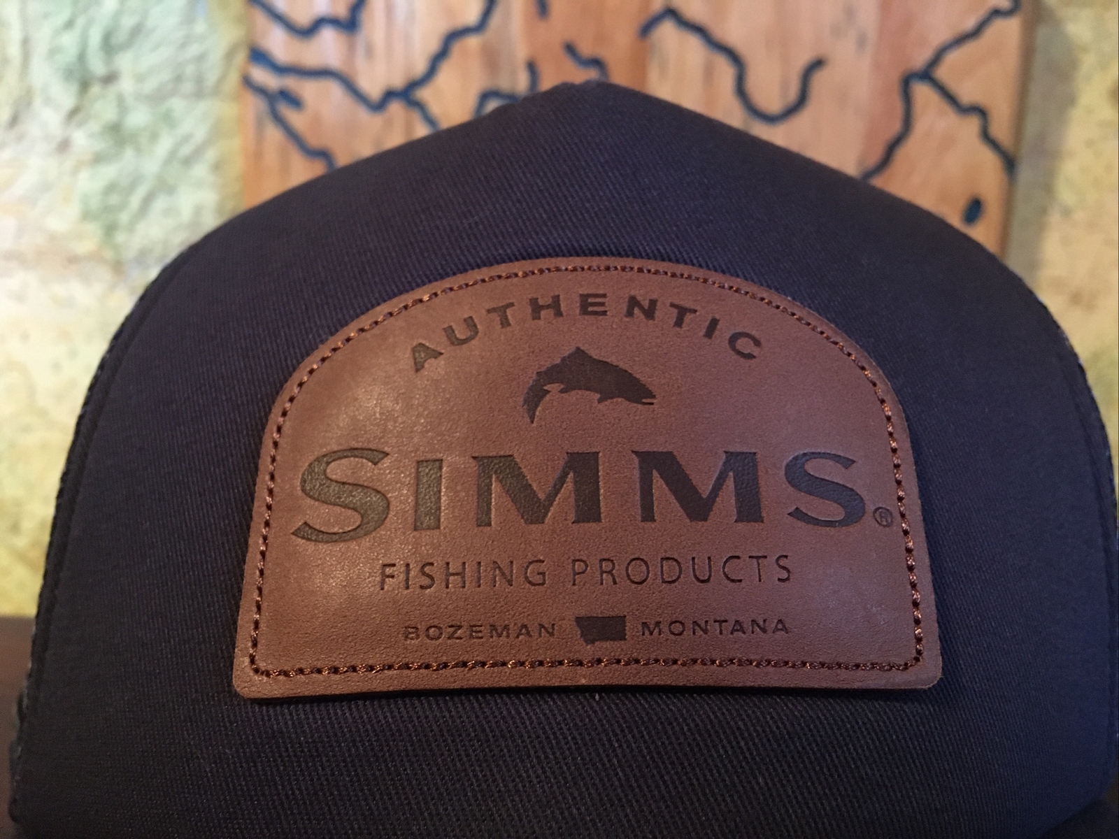 Simms Fishing Products Leather Patch trucker hat