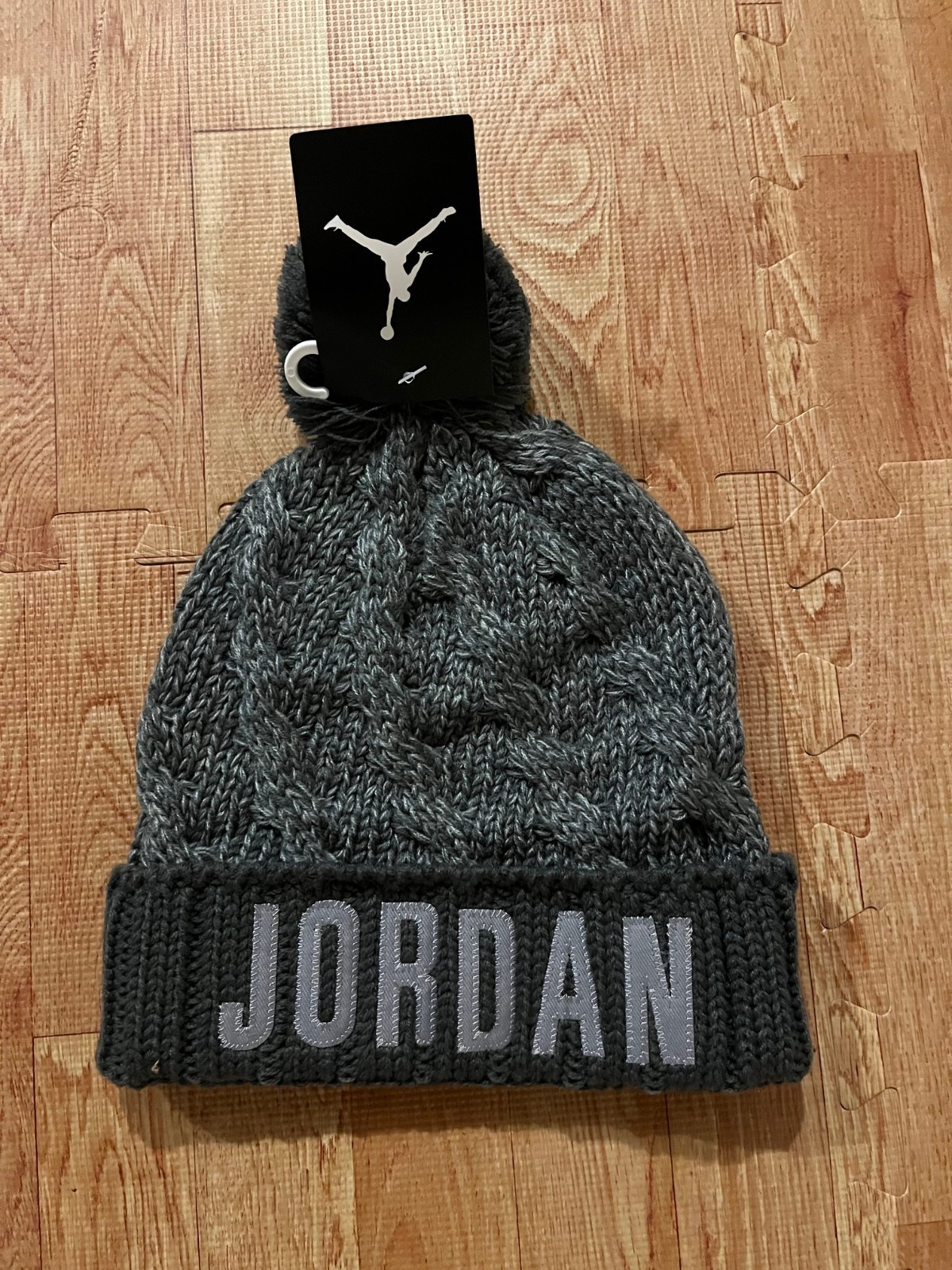 Nike Air Jordan Jumpman Pom Knit Beanie Winter Hat Gray Spellout Logo 9A1829-ADG
