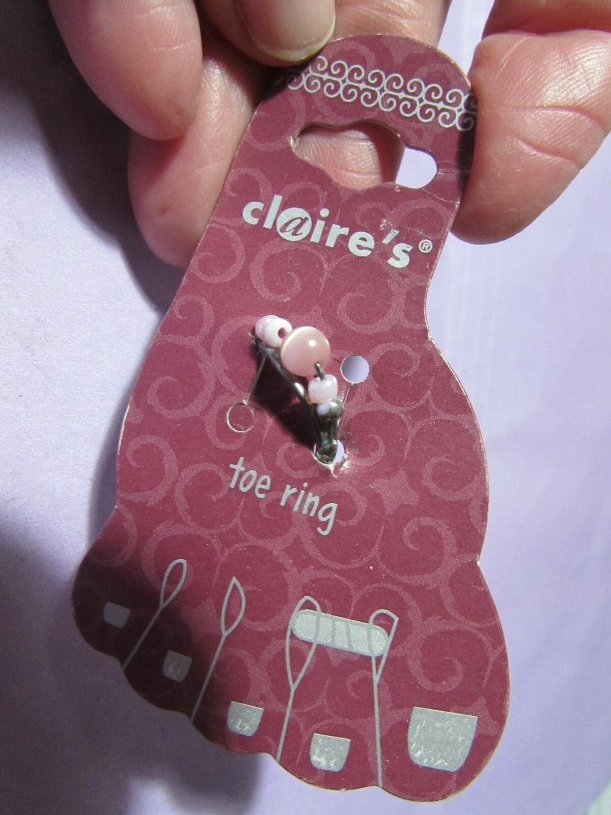 CLAIRE's BOUTIQUE silvertone toe ring with pink beads