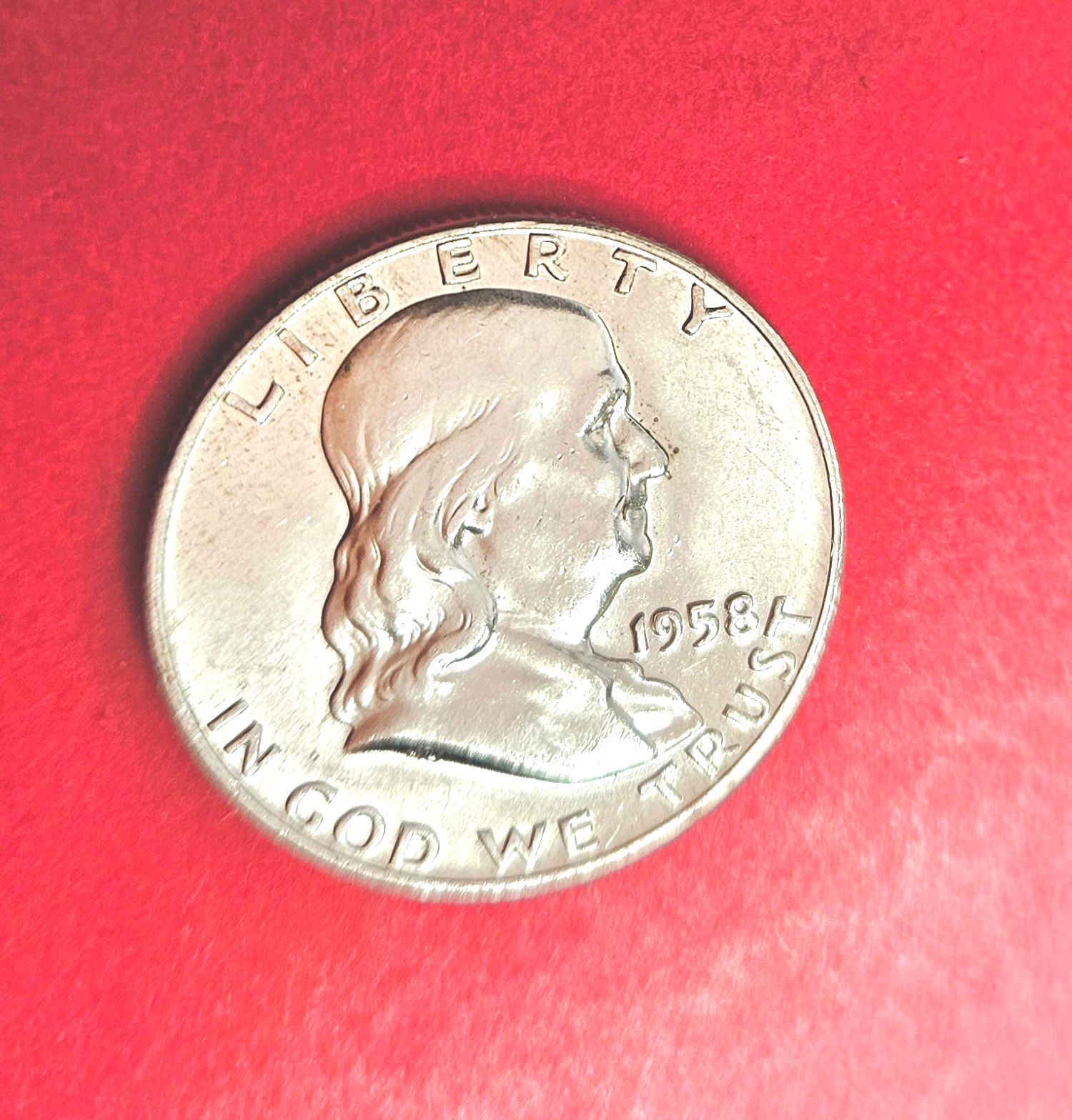 1958 D  Franklin Silver Half Dollar.  EF. Nice Bell Lines. 90% Silver.