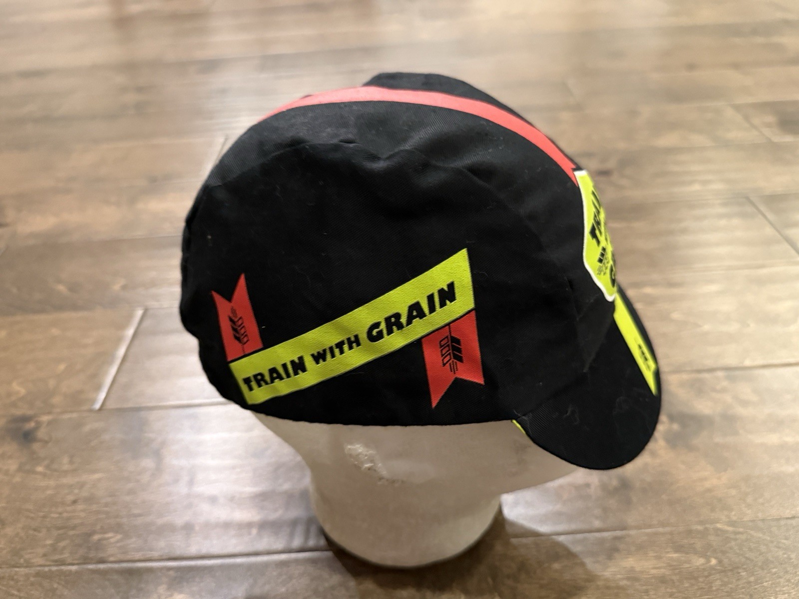 Bobs Red Mill Train With Grain Hot For Podium Black Cycling Stretched Hat Cap