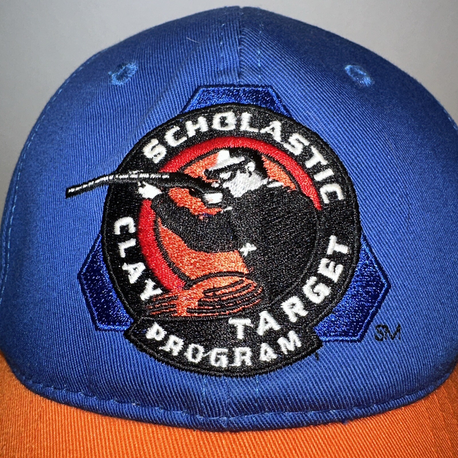 Scholastic Clay Target Program Hat Cap Orange Bill Royal Blue Hook Loop EUC